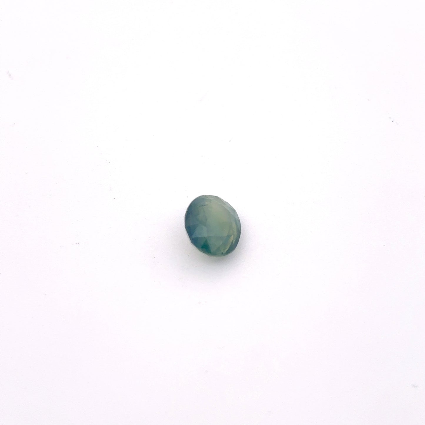 Natural Bluish Green Mermaid Sapphire 0.77 carat 5.5x4.8mm Oval Cut, Heated