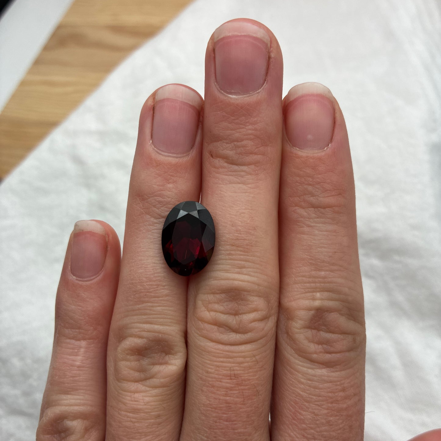 7.8 carat Purplish Red Garnet 14x10mm Oval Cut