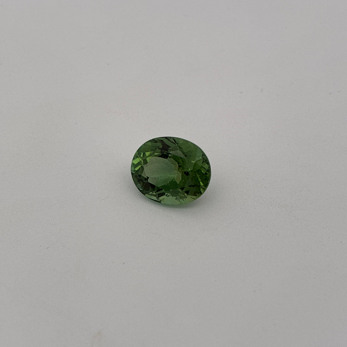 10x8mm Oval Cut Green Tourmaline 2.89 carat Gem with wear