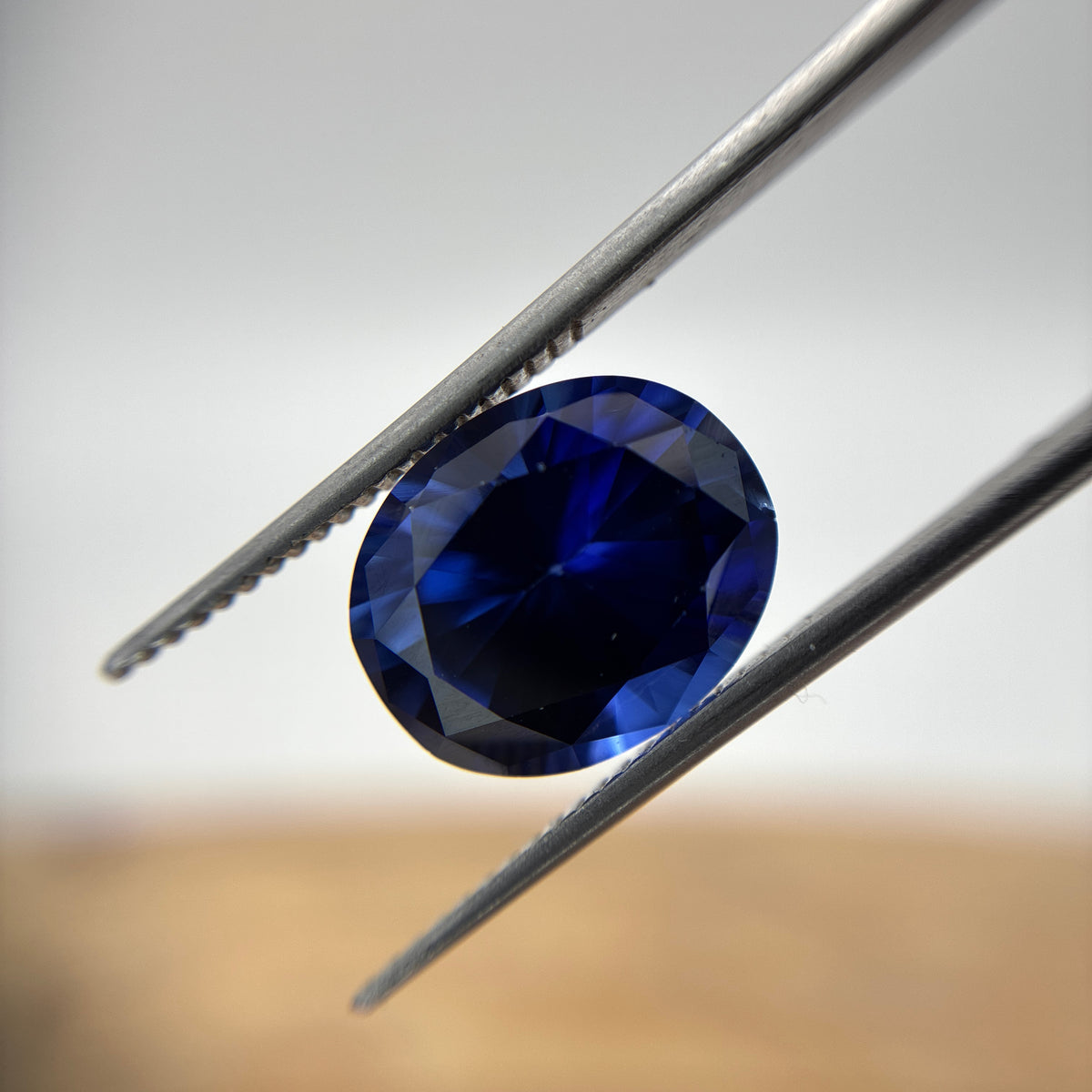 12x10mm Oval Cut Dark Blue Lab Sapphire, 6 carats
