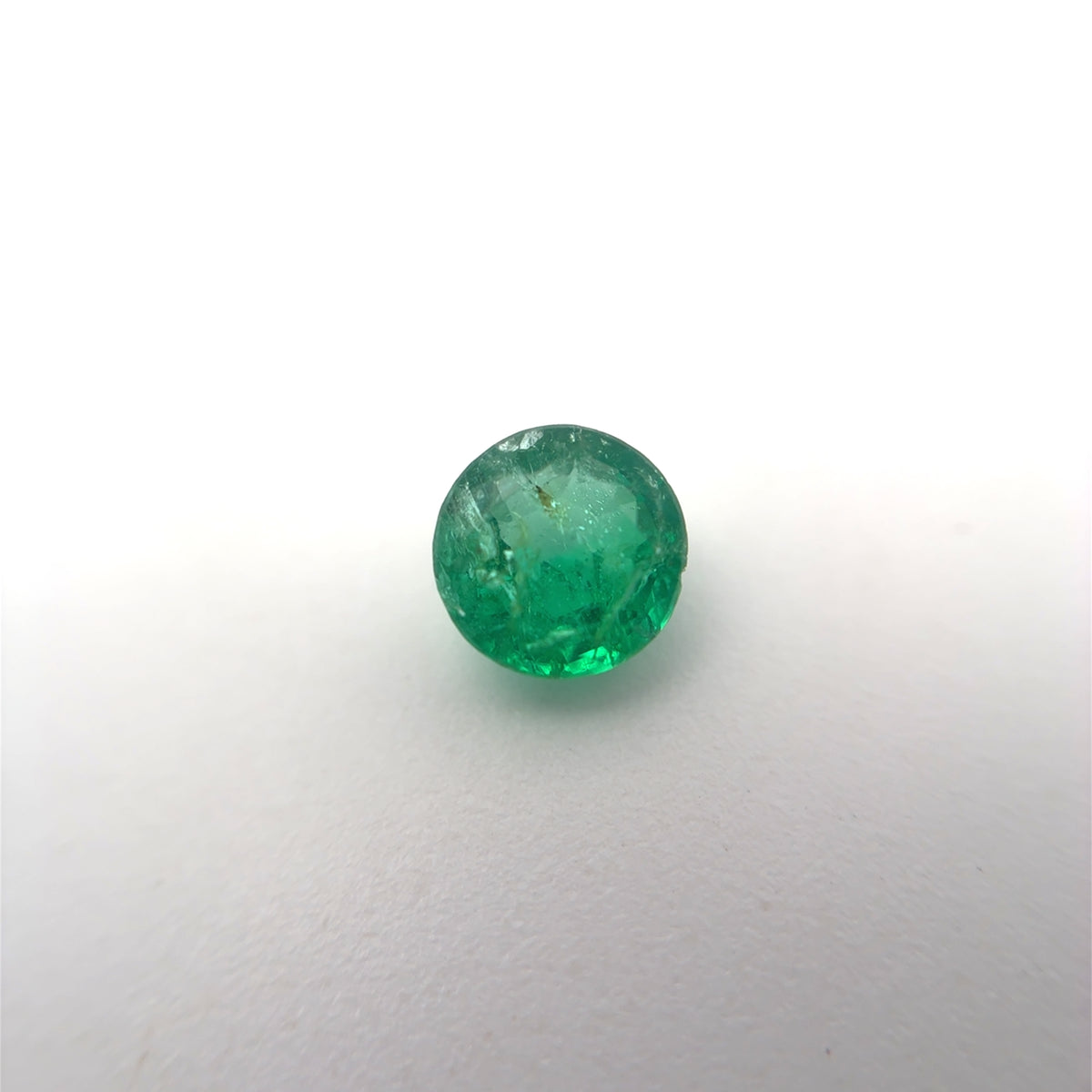 5.4mm Round Cut Green Emerald, 0.63 carat Natural Gem