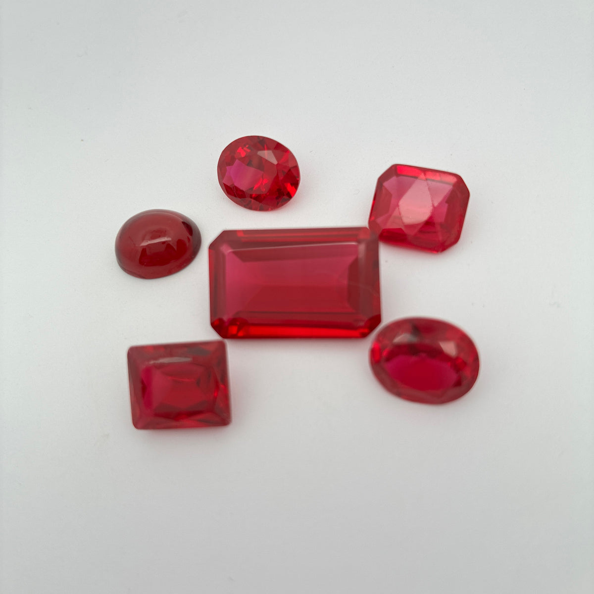 52 carat Lot of Lab Created Rubies, Discounted Worn Recycled, Chipped, Damaged Gemstones, 6 Stones