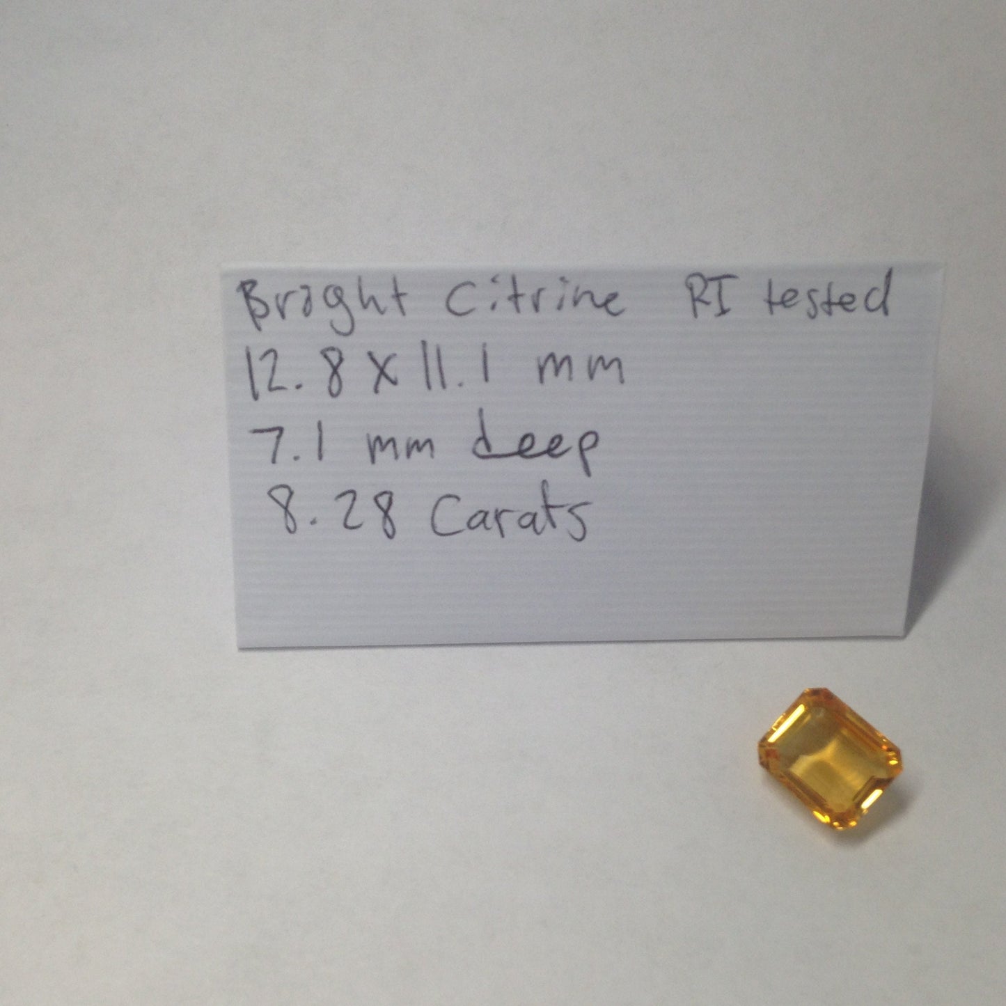 Orange yellow Quartz citrine  13x11 mm loose gemstone unmounted preowned  faceted jewelry supplies gem stone  8.28 carats rectangle emerald