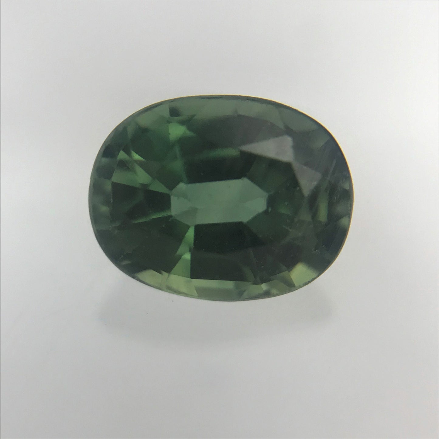 0.86 carat Natural Green Sapphire 6x4.7mm Oval Cut Corundum Faceted Loose Gemstone