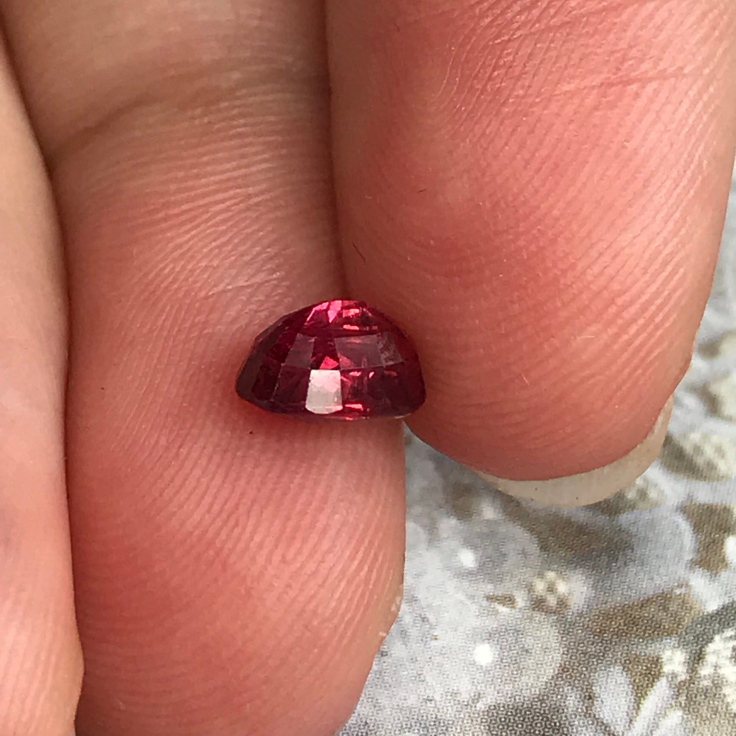 1.31 Carat Natural Red Sapphire 6.7x5mm Oval Cut, BE Treated Orangish Red Sapphire