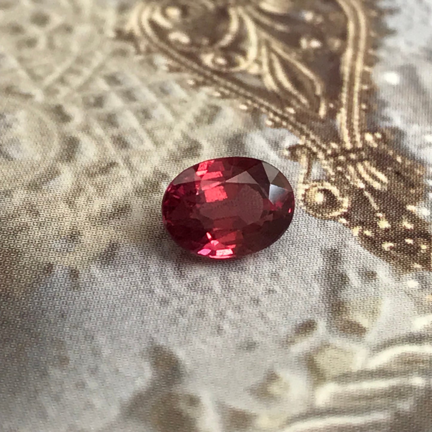1.31 Carat Natural Red Sapphire 6.7x5mm Oval Cut, BE Treated Orangish Red Sapphire