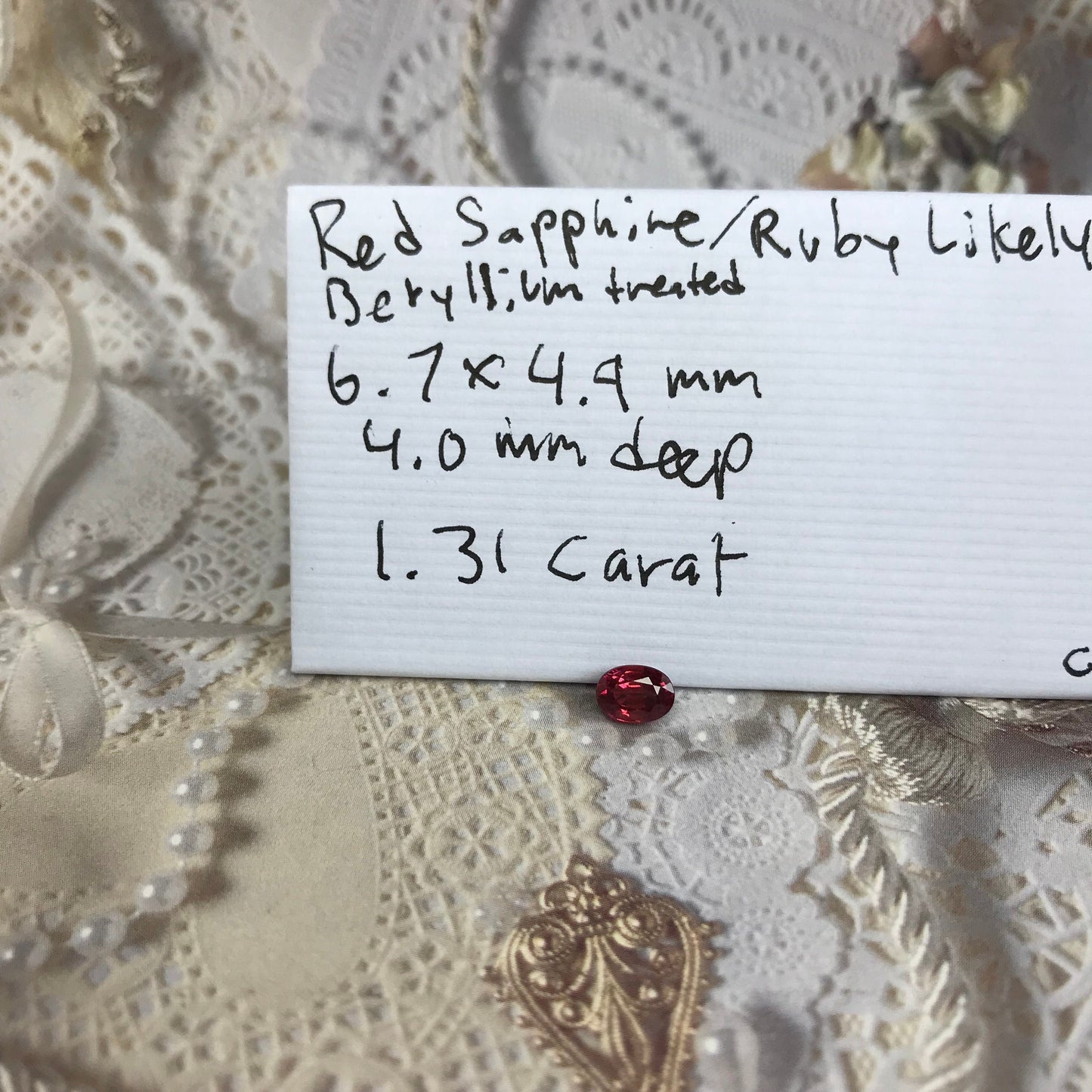 1.31 Carat Natural Red Sapphire 6.7x5mm Oval Cut, BE Treated Orangish Red Sapphire