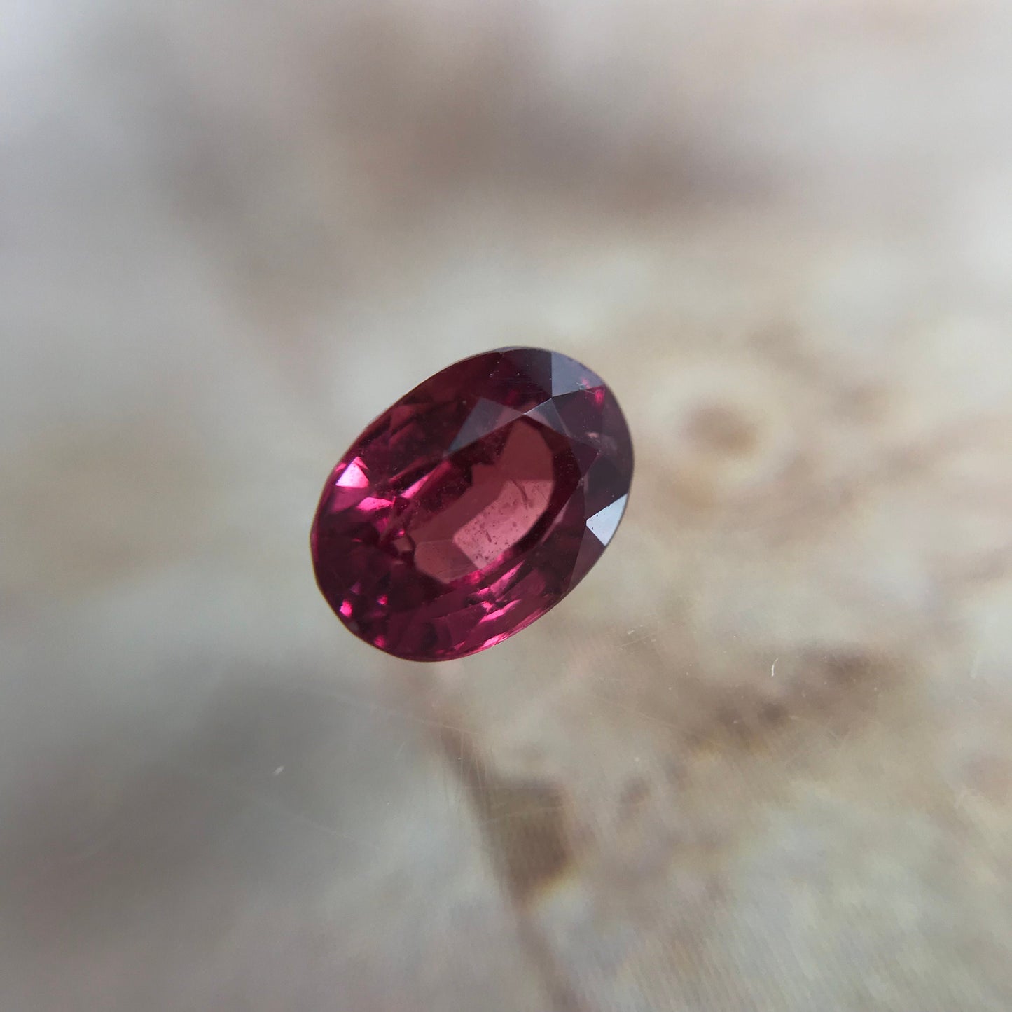 1.31 Carat Natural Red Sapphire 6.7x5mm Oval Cut, BE Treated Orangish Red Sapphire