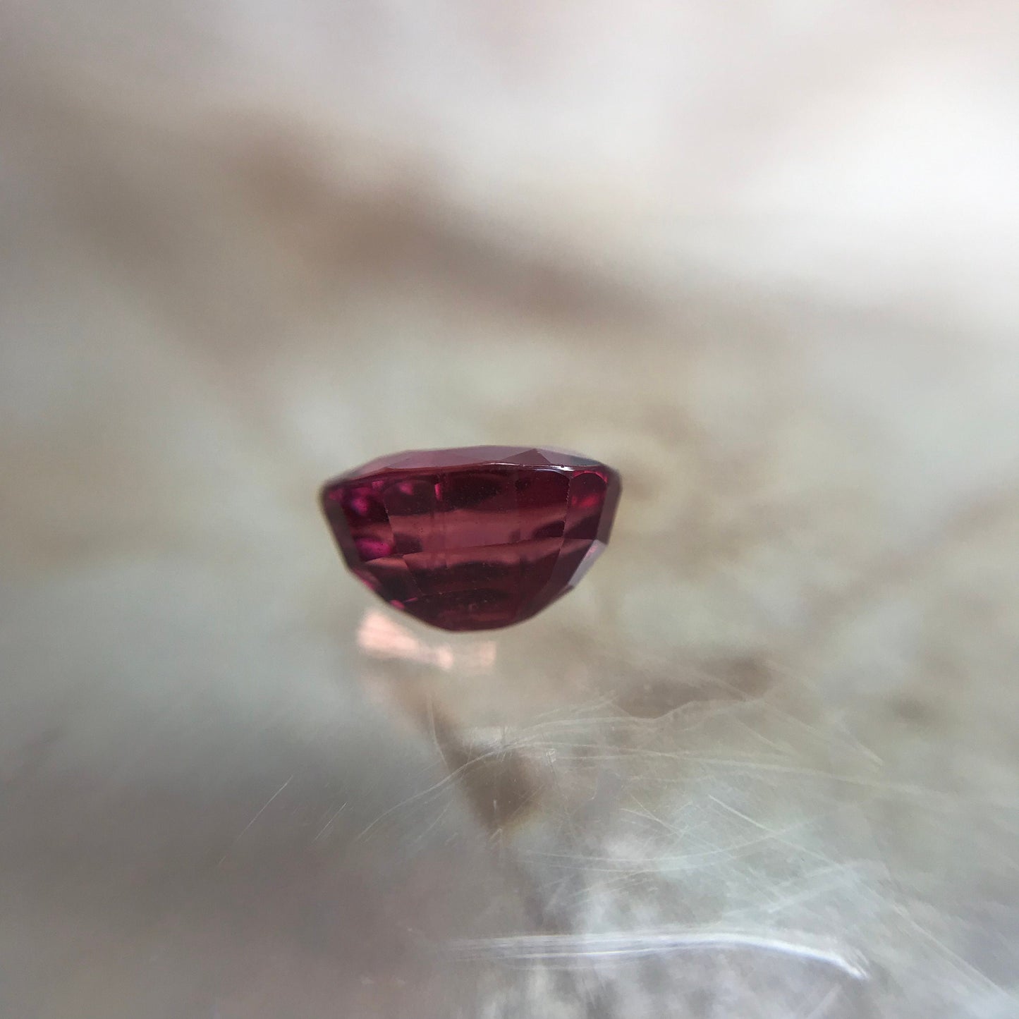 1.31 Carat Natural Red Sapphire 6.7x5mm Oval Cut, BE Treated Orangish Red Sapphire