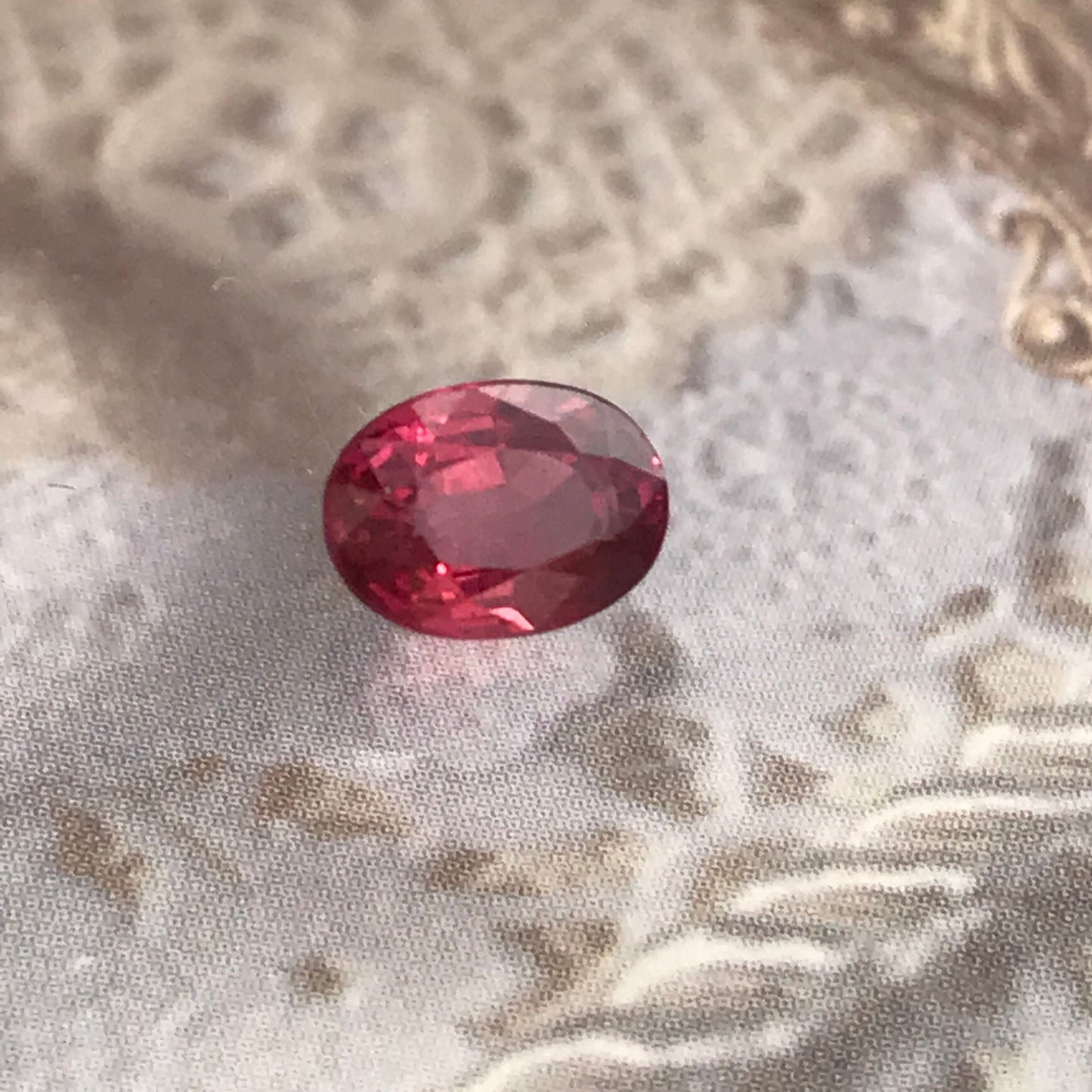 1.31 Carat Natural Red Sapphire 6.7x5mm Oval Cut, BE Treated Orangish Red Sapphire