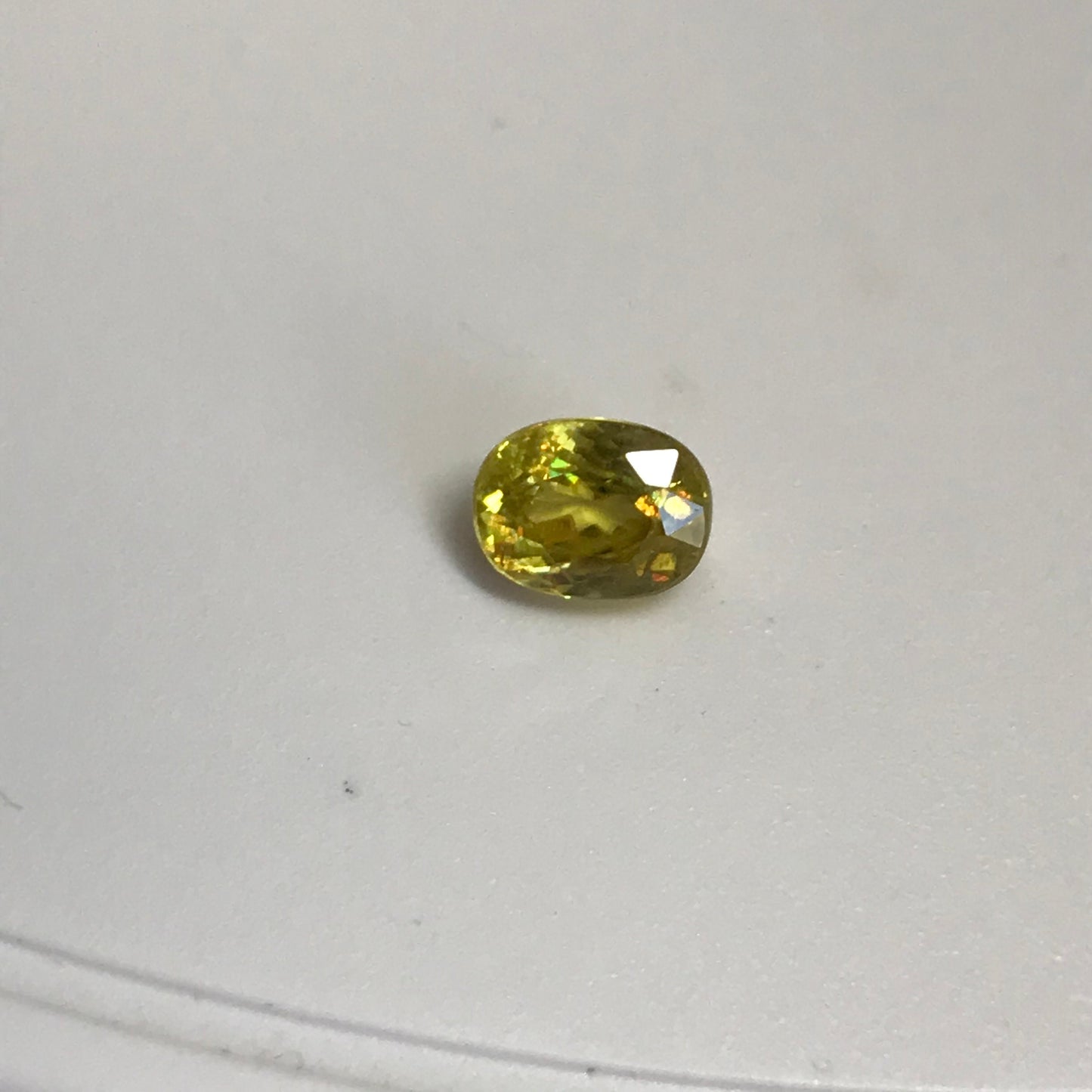 Yellow Sphene 1.23 Carat 6.8x5.2mm Oval Cut, Natural loose wholesale gemstone