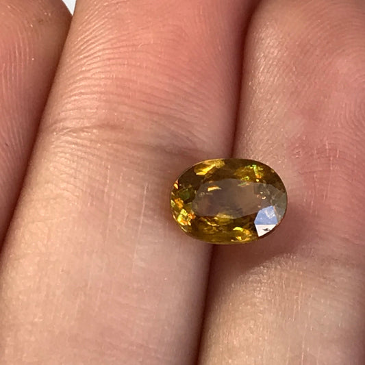 Yellowish Orange Sphene 1.59 Carat 8x6mm Oval Cut, Natural loose wholesale gemstone
