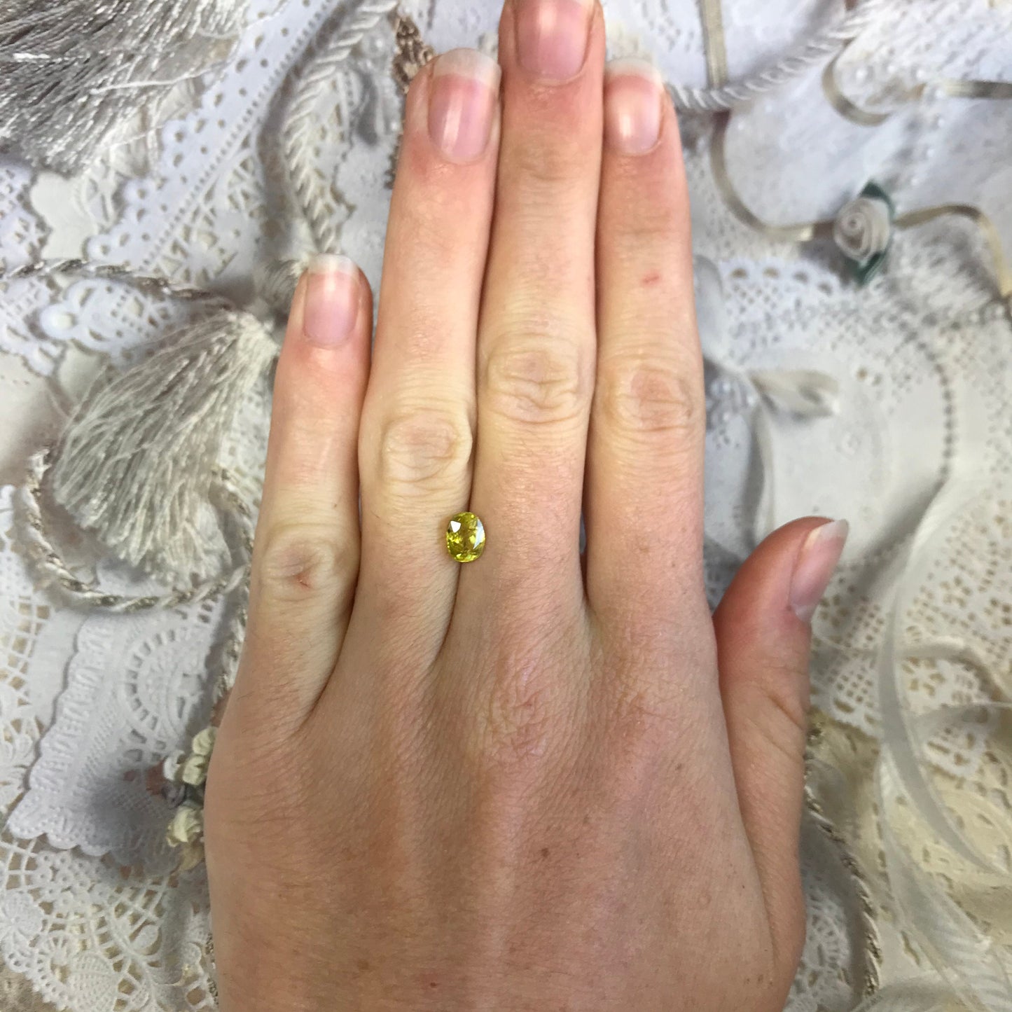 Yellow Sphene 1.23 Carat 6.8x5.2mm Oval Cut, Natural loose wholesale gemstone