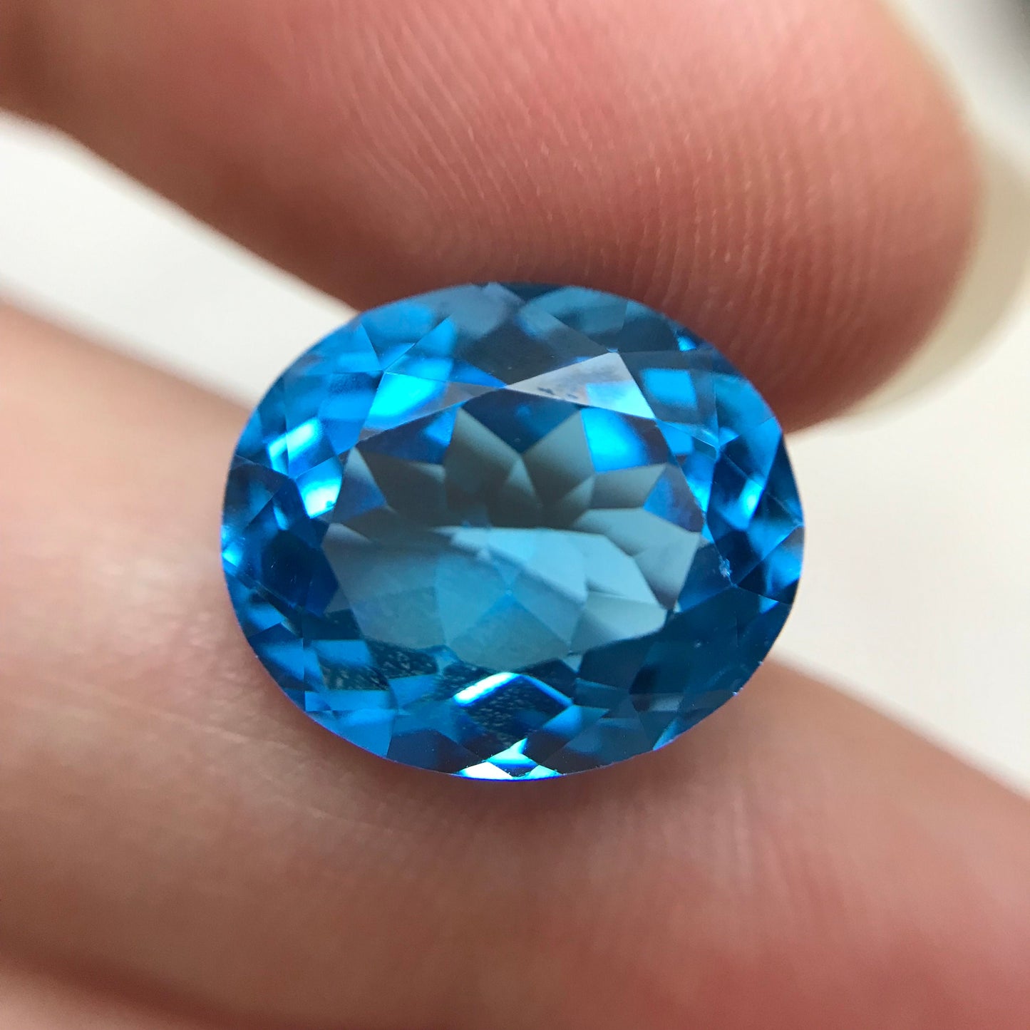 Swiss Blue Topaz 14x12mm Oval Cut Loose Topaz 10 ct Gemstones Bright Blue Topaz Faceted Very Blue Topaz Unmounted December Birthstone