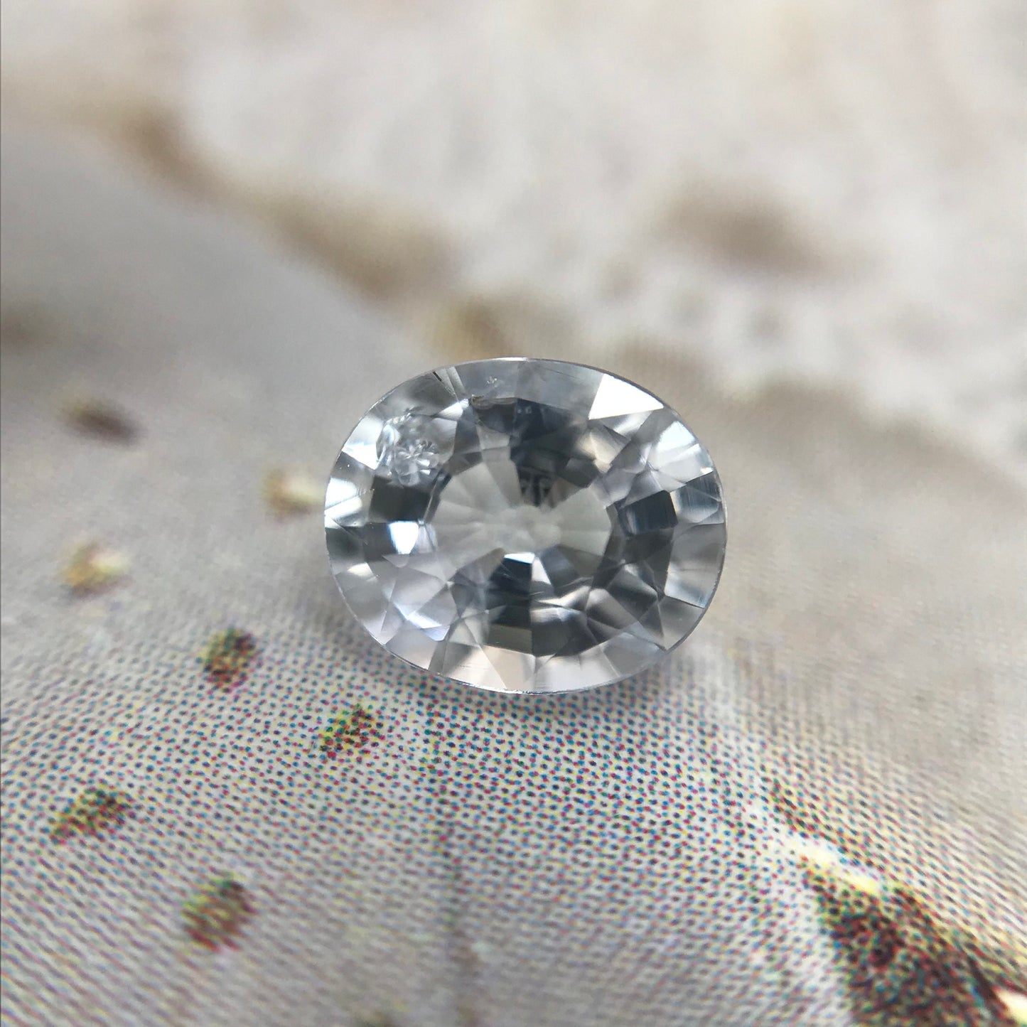Natural Sapphire 0.70 carat 5.5x4.5 mm Oval Cut, Faceted Loose Gemstone Very Light Blue Almost Clear Unmounted Gem