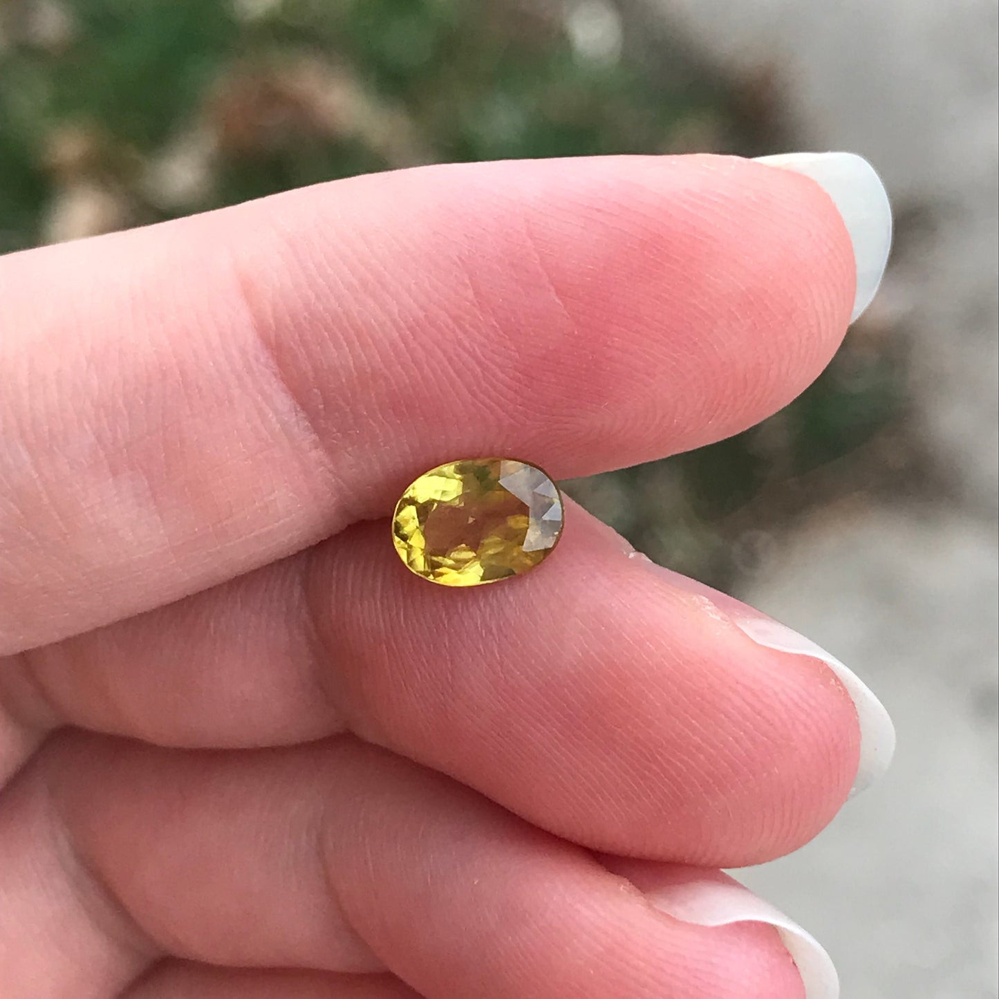 0.96 ct Yellow Sphene 7.5x5.5mm Oval Cut, Natural Untreated from Madagascar, 1 carat Greenish Yellow Sphene with Rainbow Flashes