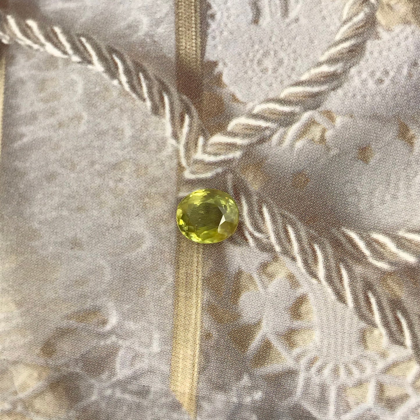 Yellowish Green Sphene 6.5x5.5mm Oval Cut 0.99 carat, Natural Madagascar Sphene, Faceted Loose Titanite