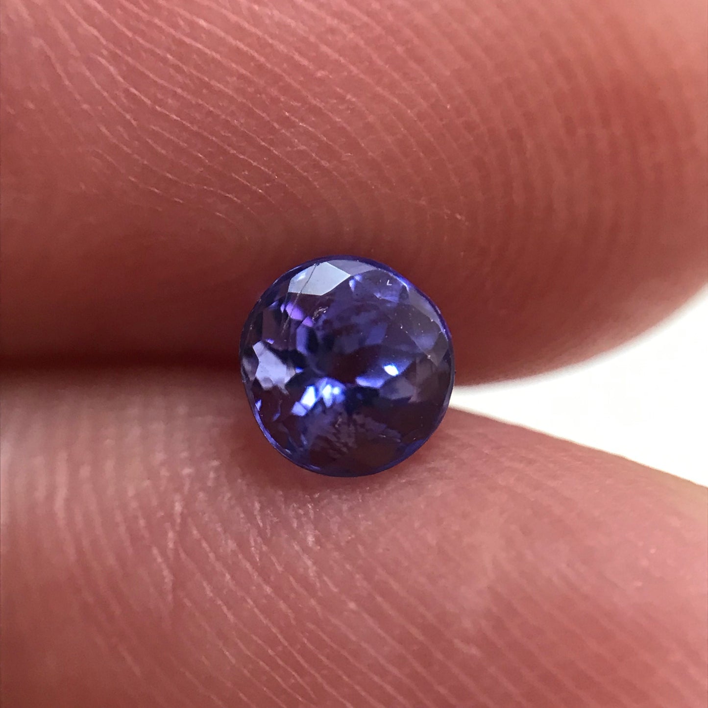 Natural Violet Blue Tanzanite 0.53 Carat 4.5mm Round Cut, Faceted Loose Unmounted Gemstone