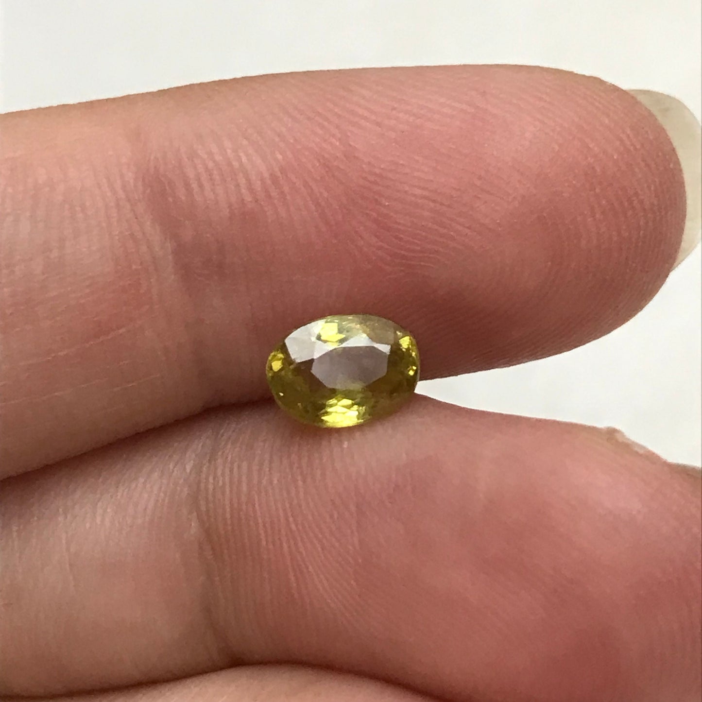 7x5mm Yellow Sphene, 0.89 Ct, Oval Cut, Rainbow Fire, Natural Madagascar Sphene, Faceted Loose Titanite