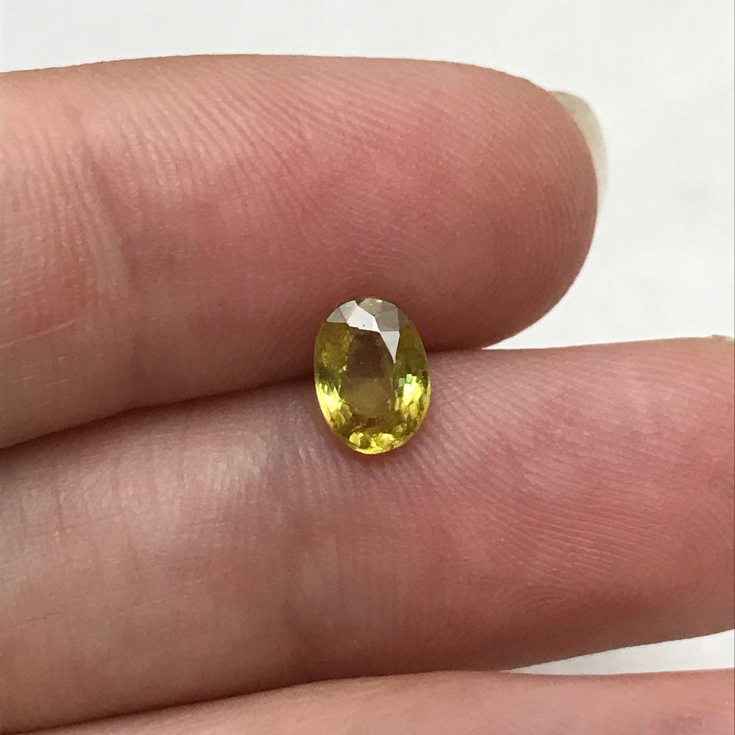 7x5mm Yellow Sphene, 0.89 Ct, Oval Cut, Rainbow Fire, Natural Madagascar Sphene, Faceted Loose Titanite