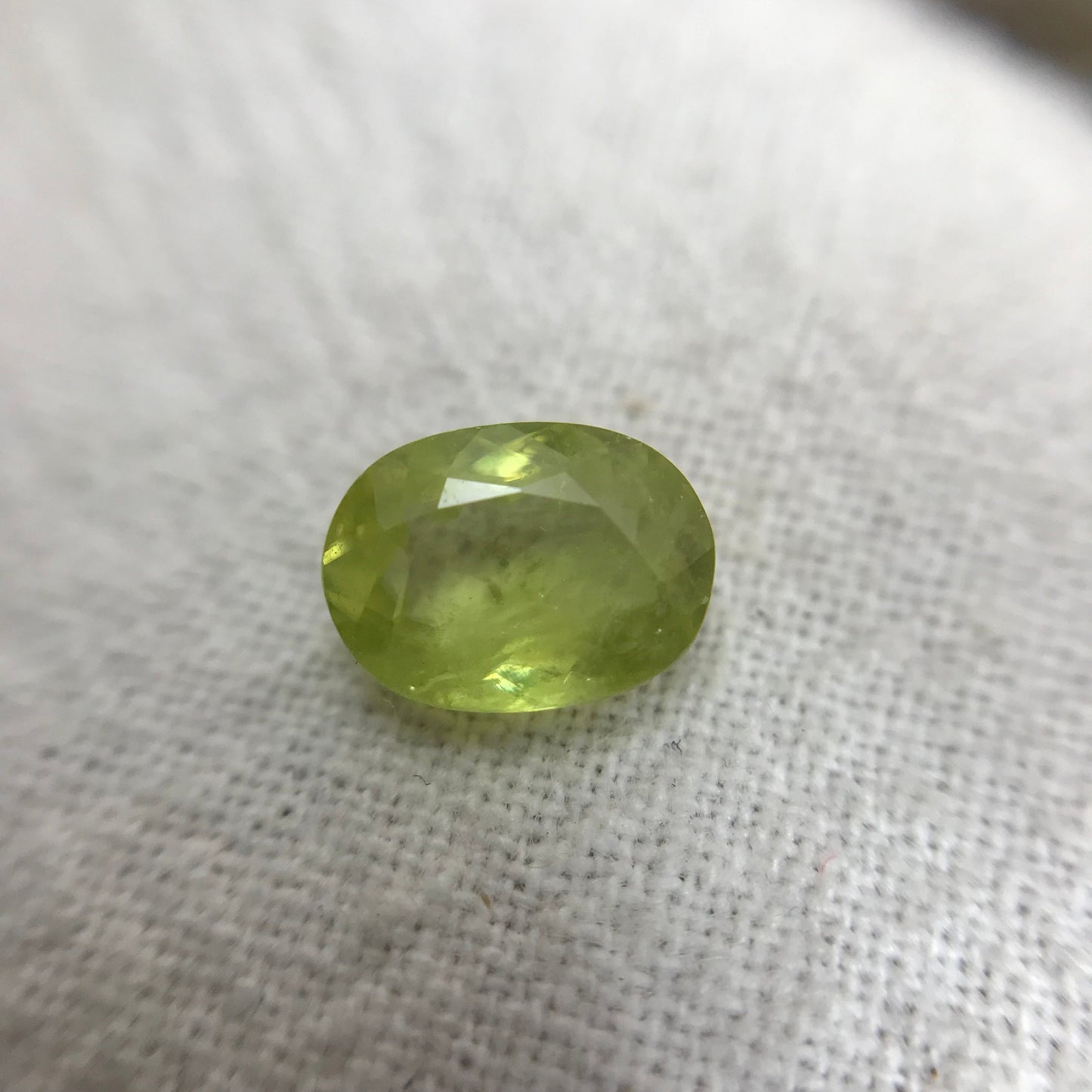 1.14 ct Yellowish Green Sphene 7.4x5.4mm Oval Cut, Natural Madagascar Sphene, Faceted Loose Gemstone