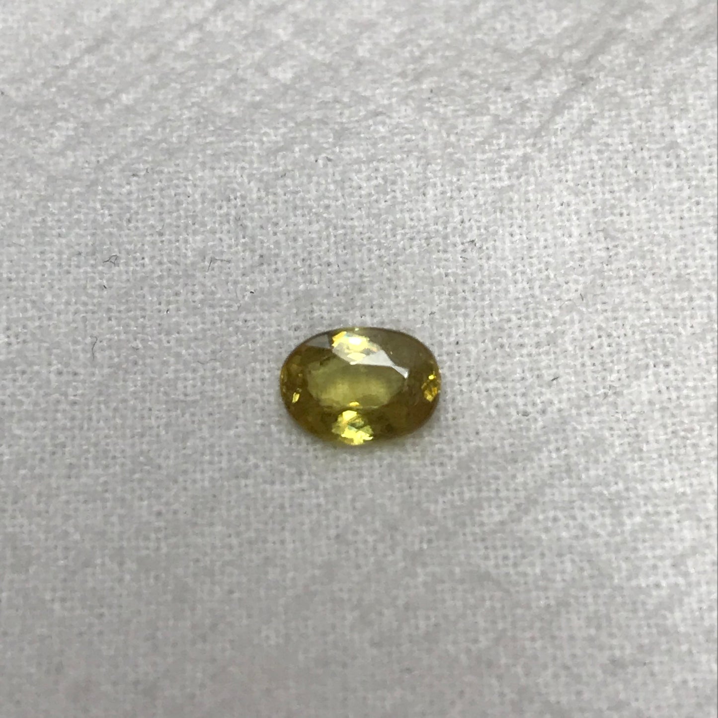 7x5mm Yellow Sphene, 0.89 Ct, Oval Cut, Rainbow Fire, Natural Madagascar Sphene, Faceted Loose Titanite
