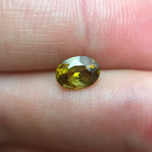 1.14 Ct Yellow Sphene, 7.3x5.3mm Oval Cut, Sphene with Rainbow Fire and Cool Inclusion, Natural Madagascar Sphene, Faceted Loose Titanite