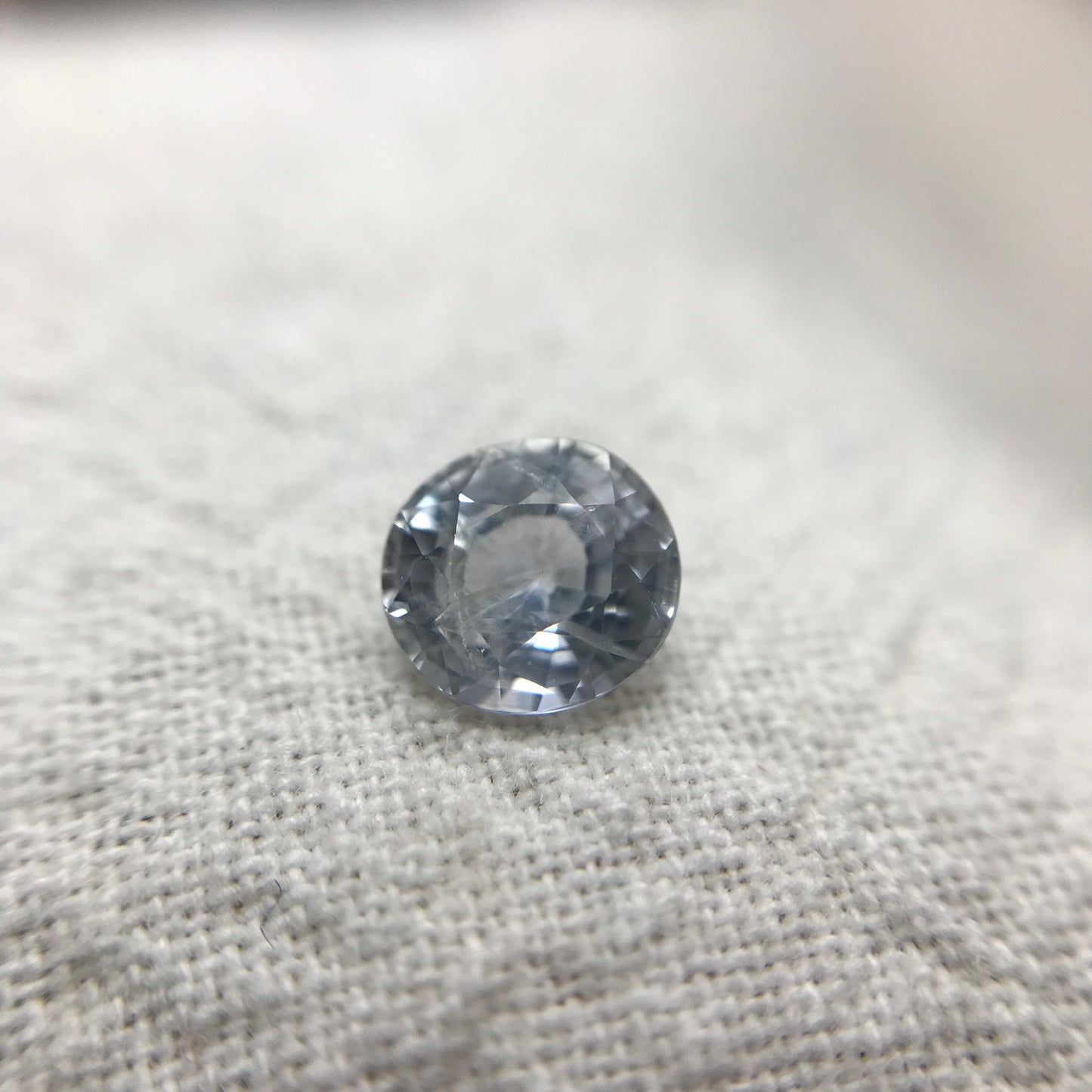 Natural Light Sapphire 6x5.5mm Oval 1.02 Carat Loose Faceted Corundum Light Ice Blue Sapphire, Nearly Colorless, Almost White Sapphire