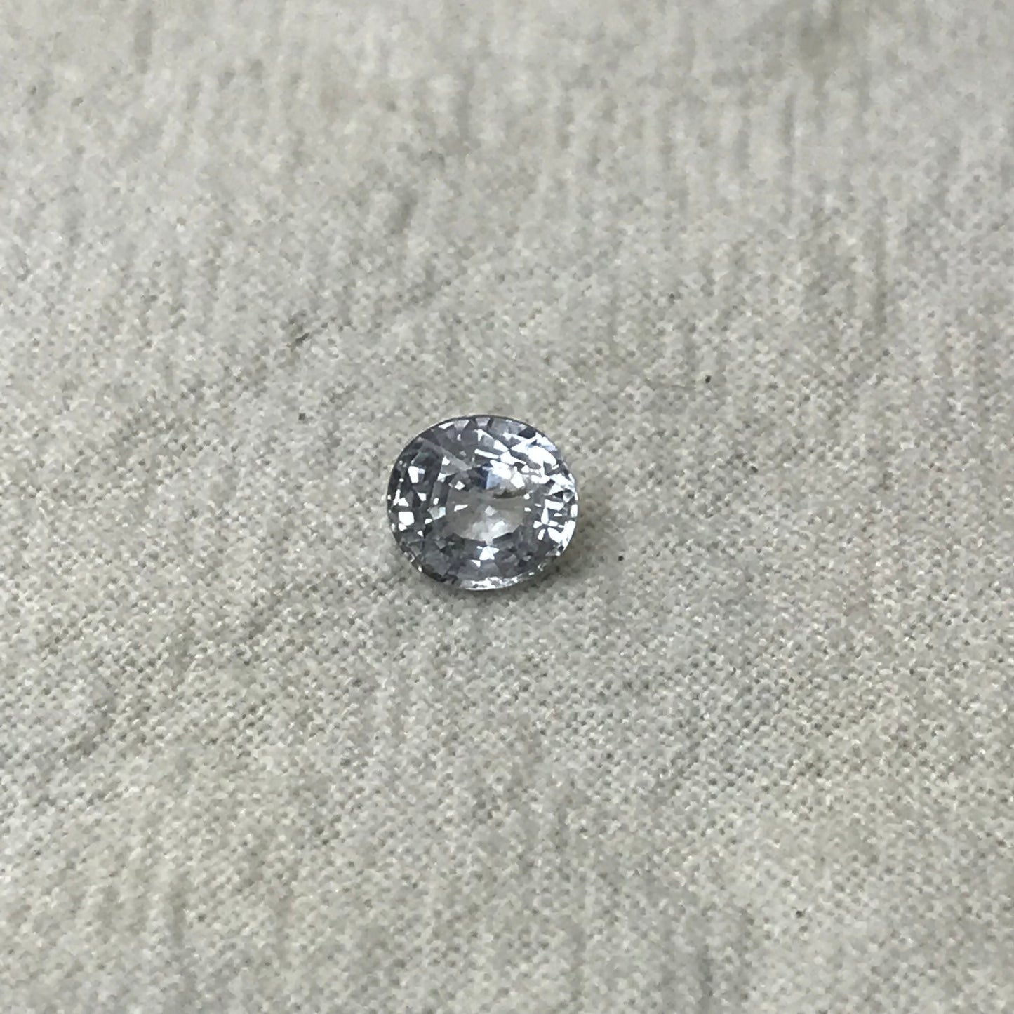 Natural Light Sapphire 6x5.5mm Oval 1.02 Carat Loose Faceted Corundum Light Ice Blue Sapphire, Nearly Colorless, Almost White Sapphire