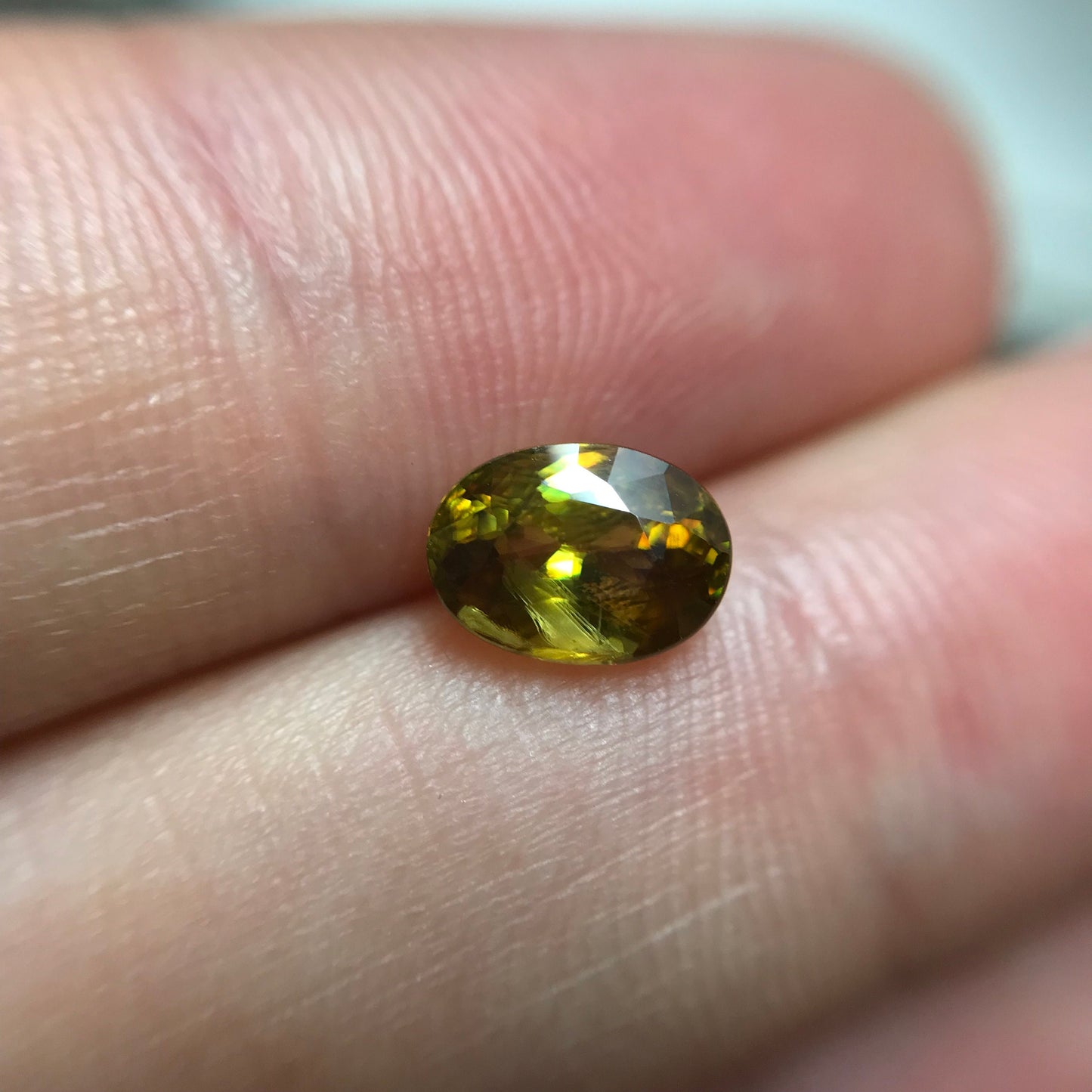 1.14 Ct Yellow Sphene, 7.3x5.3mm Oval Cut, Sphene with Rainbow Fire and Cool Inclusion, Natural Madagascar Sphene, Faceted Loose Titanite