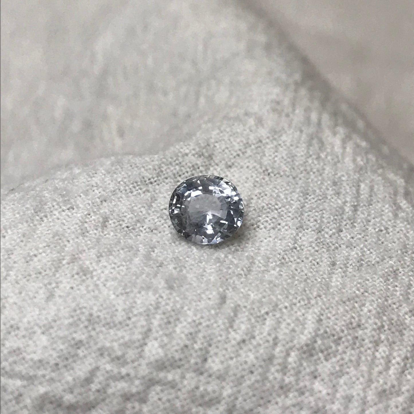 Natural Light Sapphire 6x5.5mm Oval 1.02 Carat Loose Faceted Corundum Light Ice Blue Sapphire, Nearly Colorless, Almost White Sapphire