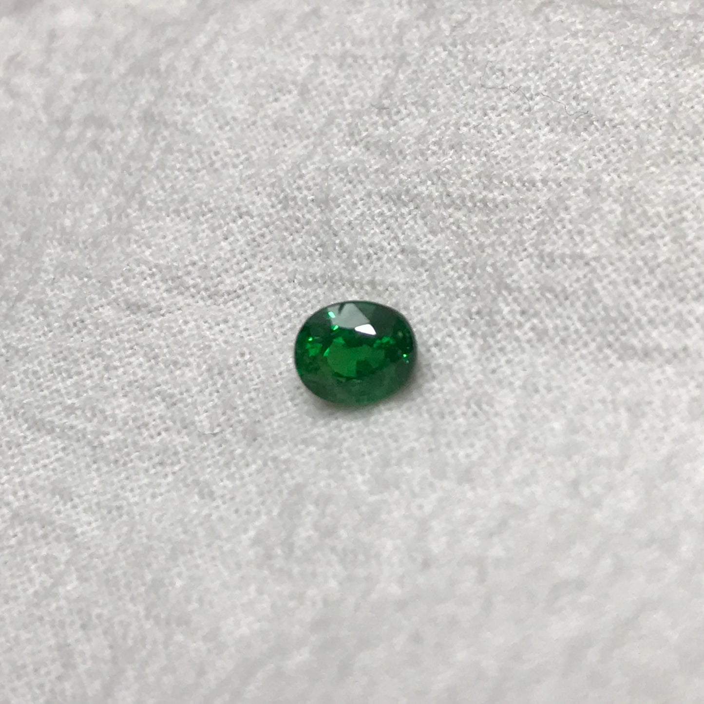 0.60 carat Natural Green Tsavorite Garnet 5.5x4.5mm Oval Cut, Faceted Loose Rich Green