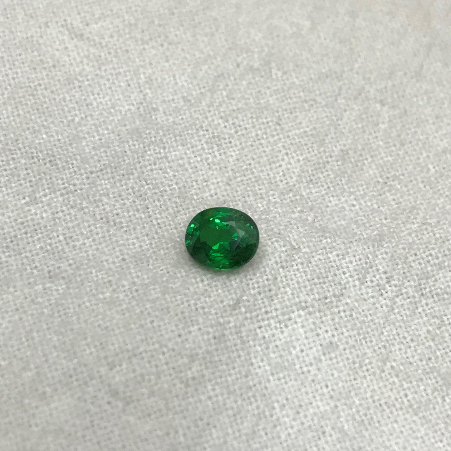 0.60 carat Natural Green Tsavorite Garnet 5.5x4.5mm Oval Cut, Faceted Loose Rich Green