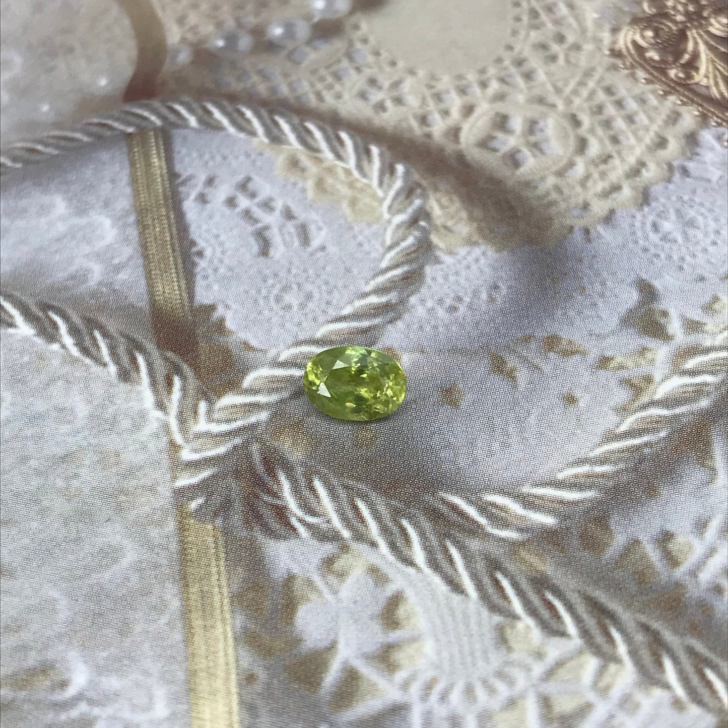 1.11 ct Yellowish Green Sphene 7x5mm Oval Cut, Natural Madagascar Sphene, Faceted Loose Titanite