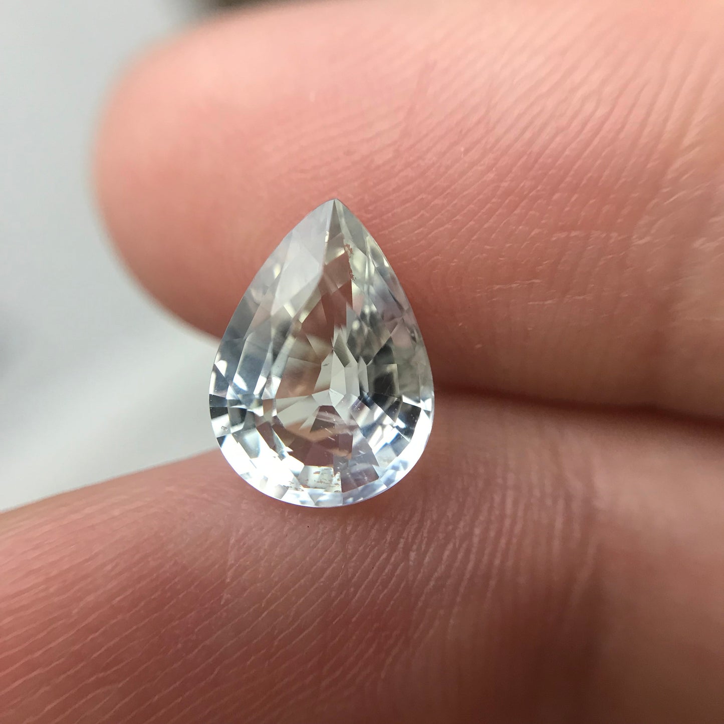 GIA Certified Light Sapphire 2.88 carat 10.5x7.7mm Pear Cut, Faceted Loose Unheated Nearly Colorless Sapphire
