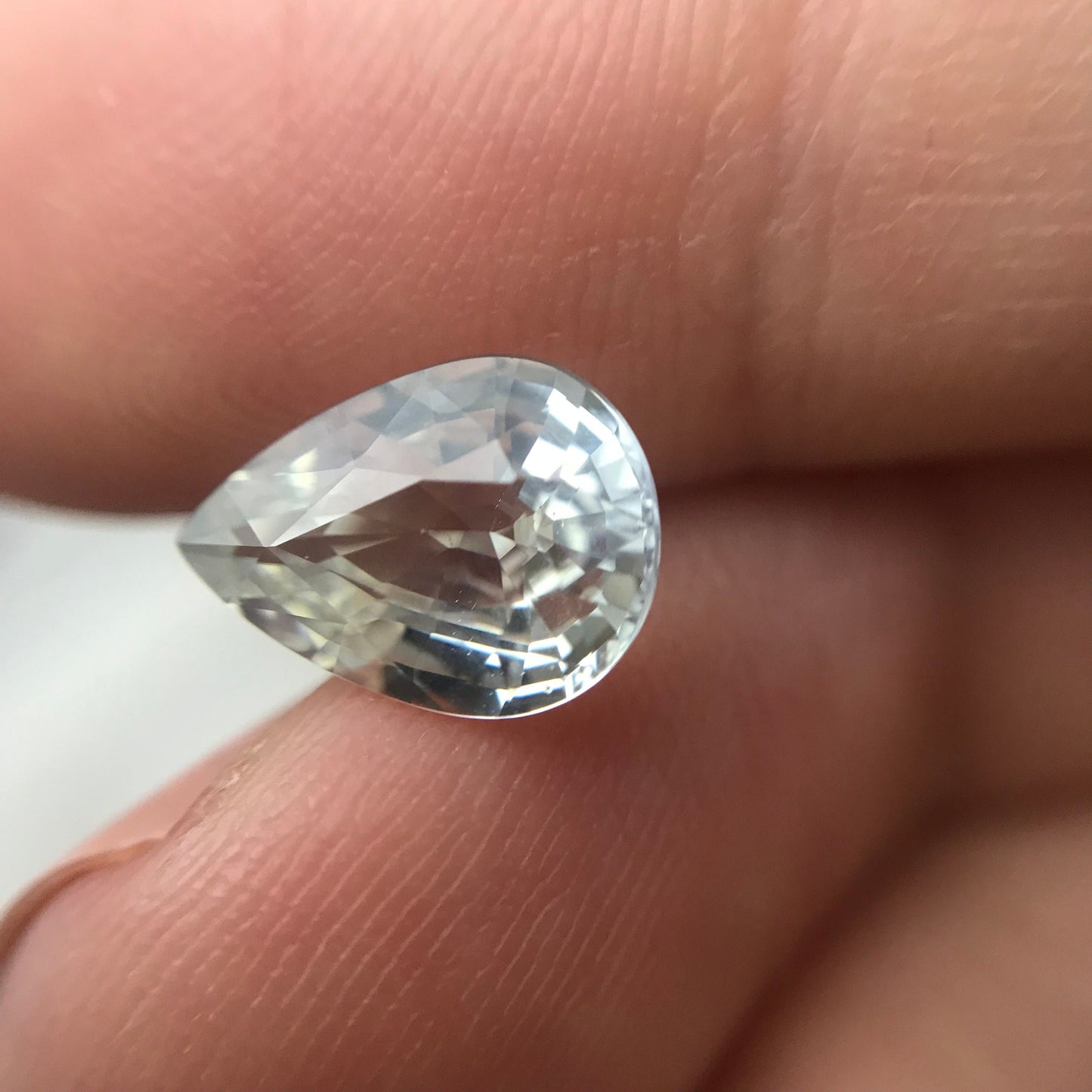 GIA Certified Light Sapphire 2.88 carat 10.5x7.7mm Pear Cut, Faceted Loose Unheated Nearly Colorless Sapphire