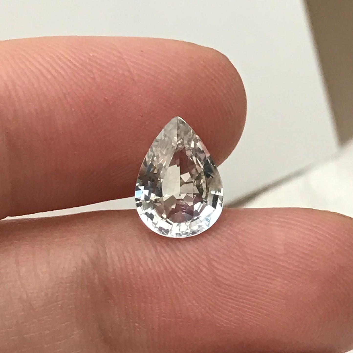 GIA Certified Light Sapphire 2.88 carat 10.5x7.7mm Pear Cut, Faceted Loose Unheated Nearly Colorless Sapphire