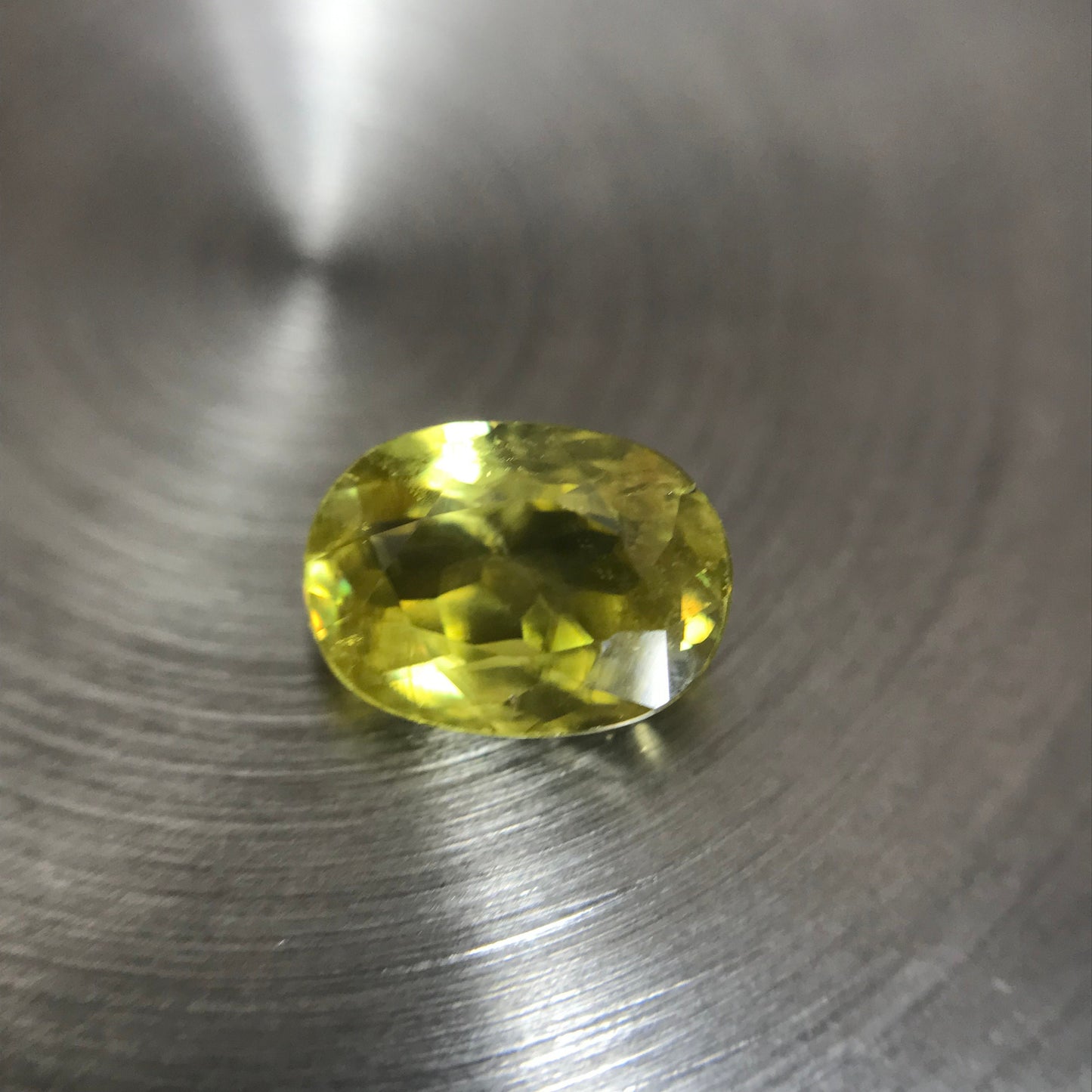 1.09 Ct. Yellow Sphene, 7.5x5.5 Oval Cut, Rainbow Fire, Natural Madagascar Sphene, Faceted Loose Titanite