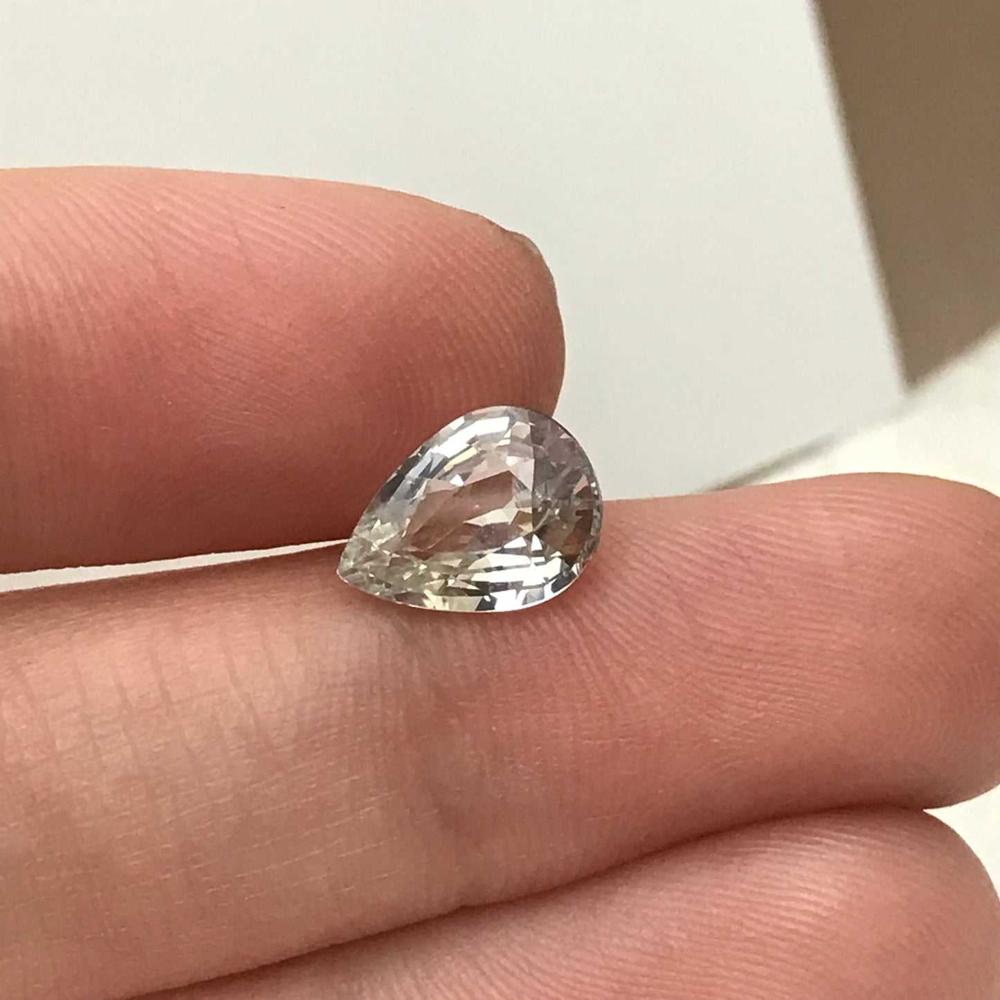 GIA Certified Light Sapphire 2.88 carat 10.5x7.7mm Pear Cut, Faceted Loose Unheated Nearly Colorless Sapphire