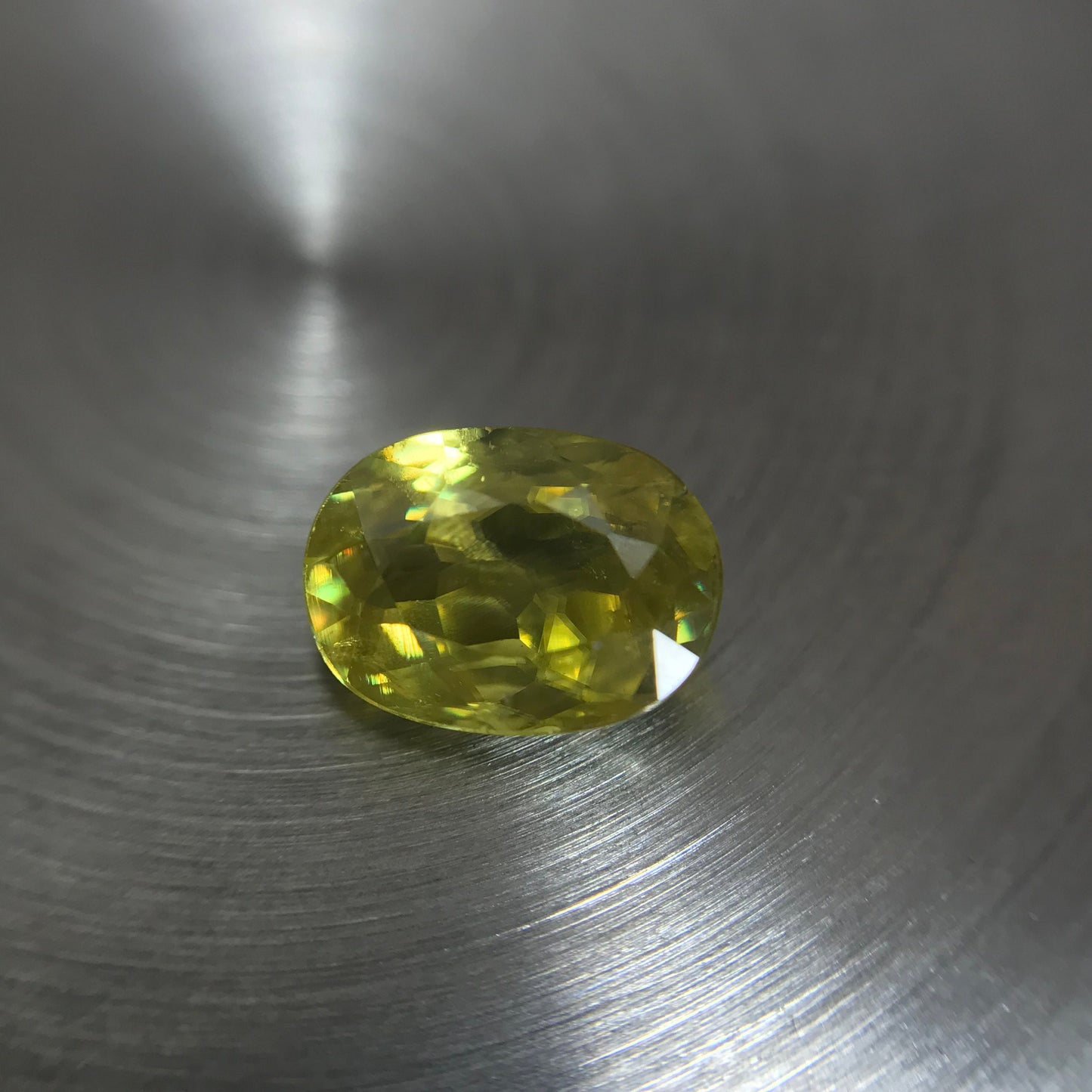 1.09 Ct. Yellow Sphene, 7.5x5.5 Oval Cut, Rainbow Fire, Natural Madagascar Sphene, Faceted Loose Titanite