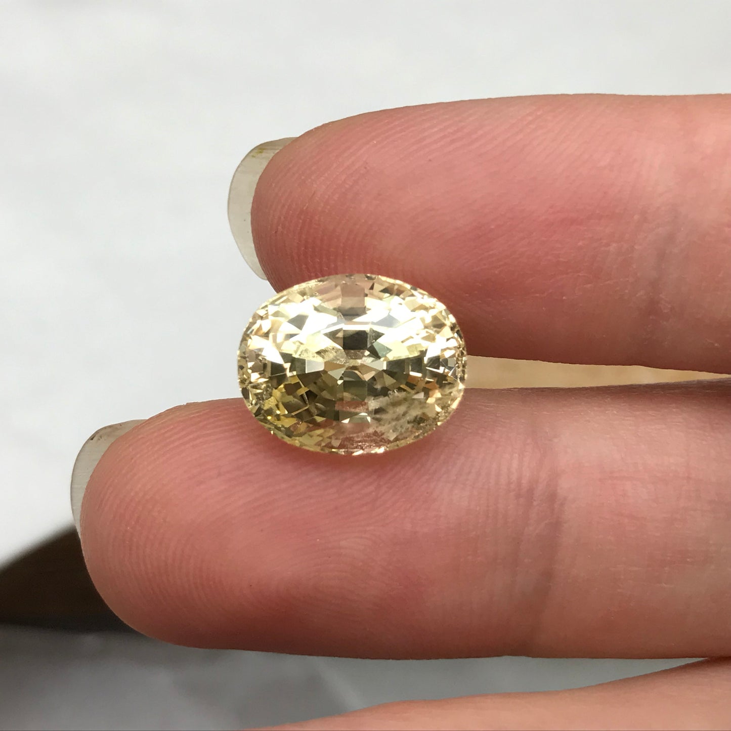 GIA Certified 10.14 Carat Unheated Yellow Sapphire 12.71x9.99mm Oval Cut, Faceted Loose Natural Sri Lanka Sapphire