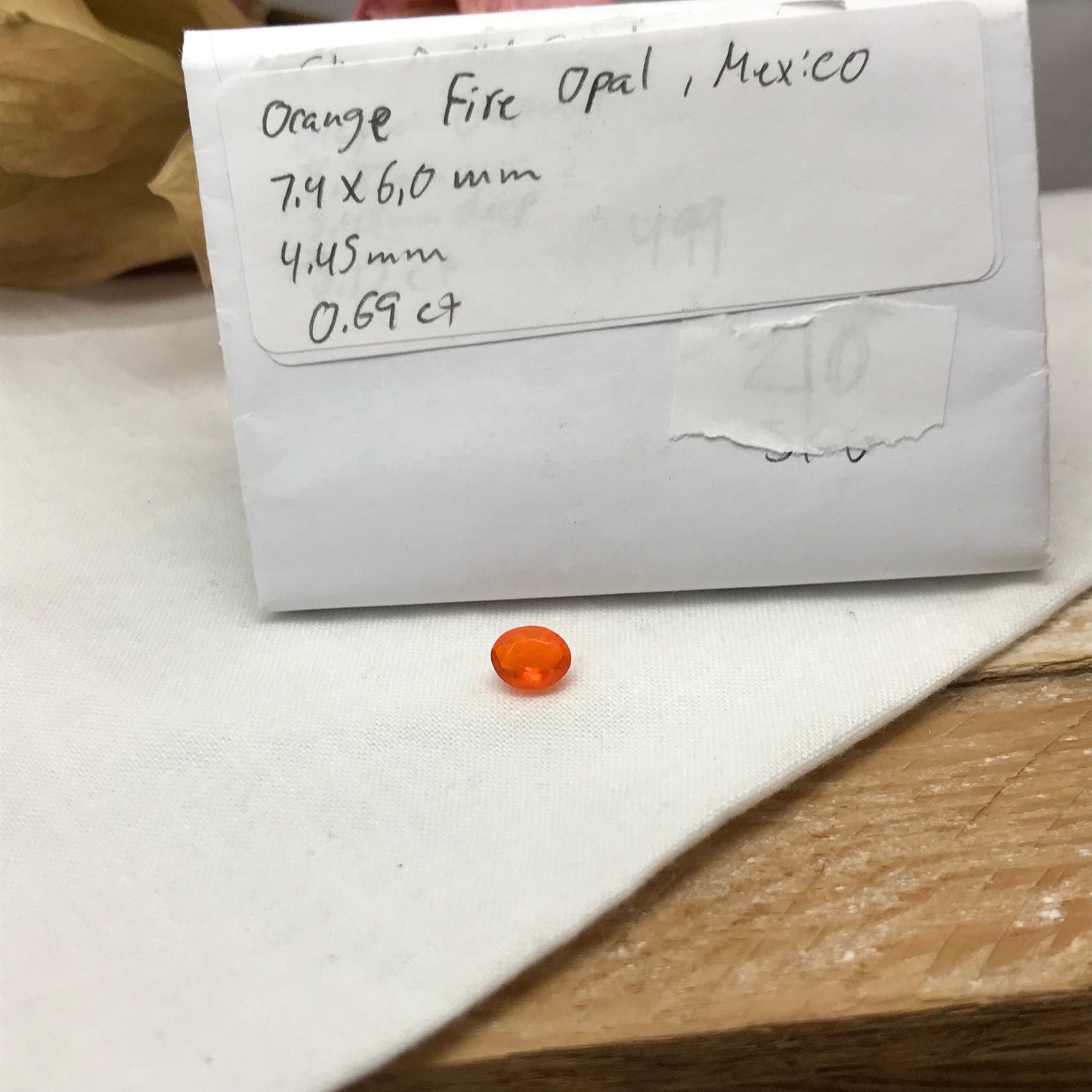 0.69 Carat Orange Mexican Fire Opal 7.4x6.0mm Oval Cut, Faceted Loose Opal