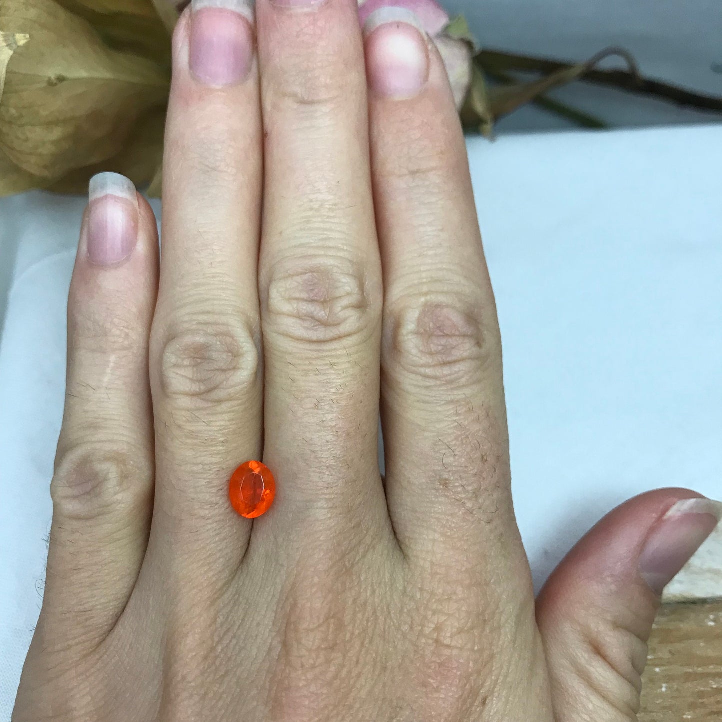 0.69 Carat Orange Mexican Fire Opal 7.4x6.0mm Oval Cut, Faceted Loose Opal