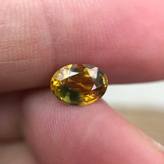 1.51 Carat Heated Yellow Orange Sapphire 7.91x5.82mm Oval Cut, Faceted Loose Gemstone, Australian Sapphire