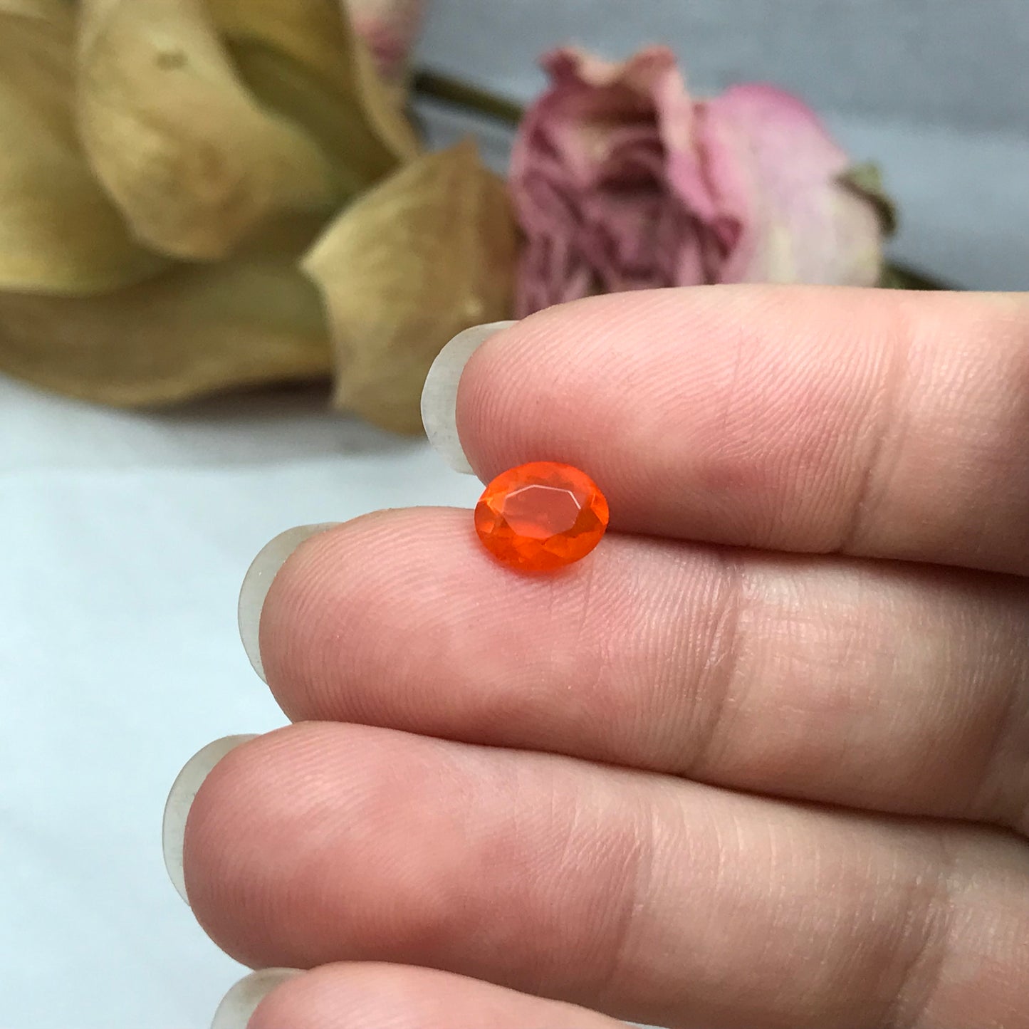 0.69 Carat Orange Mexican Fire Opal 7.4x6.0mm Oval Cut, Faceted Loose Opal