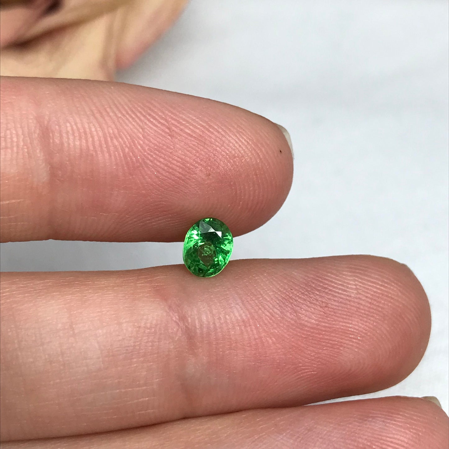 0.76 Carat Green Tsavorite Garnet 5.78x4.63mm Oval Cut, Faceted Loose Gemstone