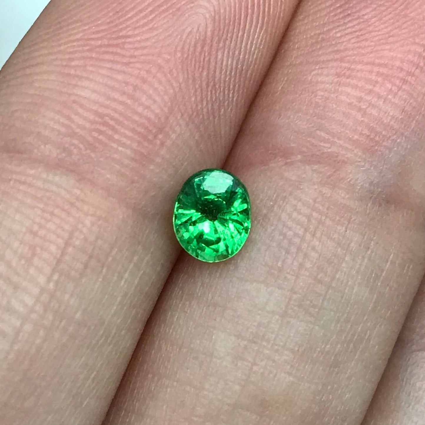 0.76 Carat Green Tsavorite Garnet 5.78x4.63mm Oval Cut, Faceted Loose Gemstone