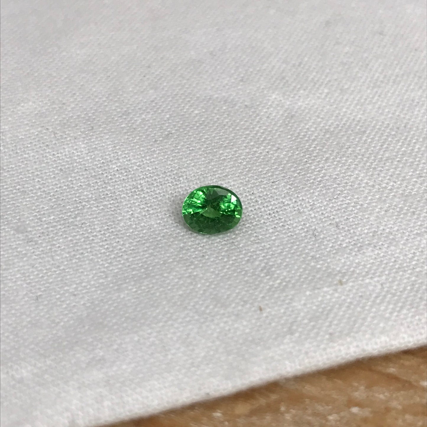 0.76 Carat Green Tsavorite Garnet 5.78x4.63mm Oval Cut, Faceted Loose Gemstone