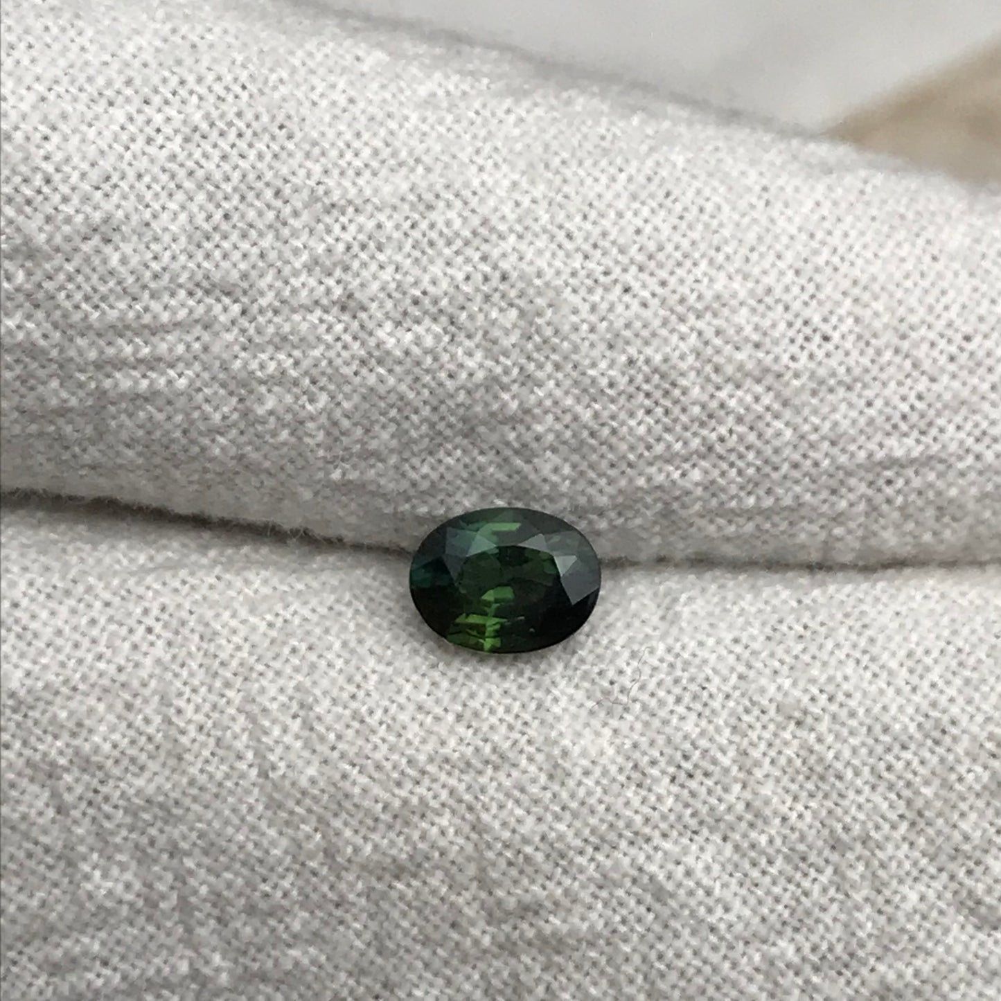 0.67 carat Natural Green Sapphire Oval Approx. 5x4.5mm