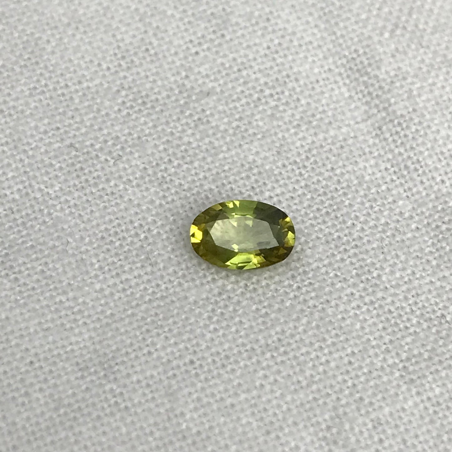 Greenish Yellow Sapphire 6x4mm, Color-Treated Yellow Green 0.53 Ct, Oval cut, BE Treated Natural Sapphire